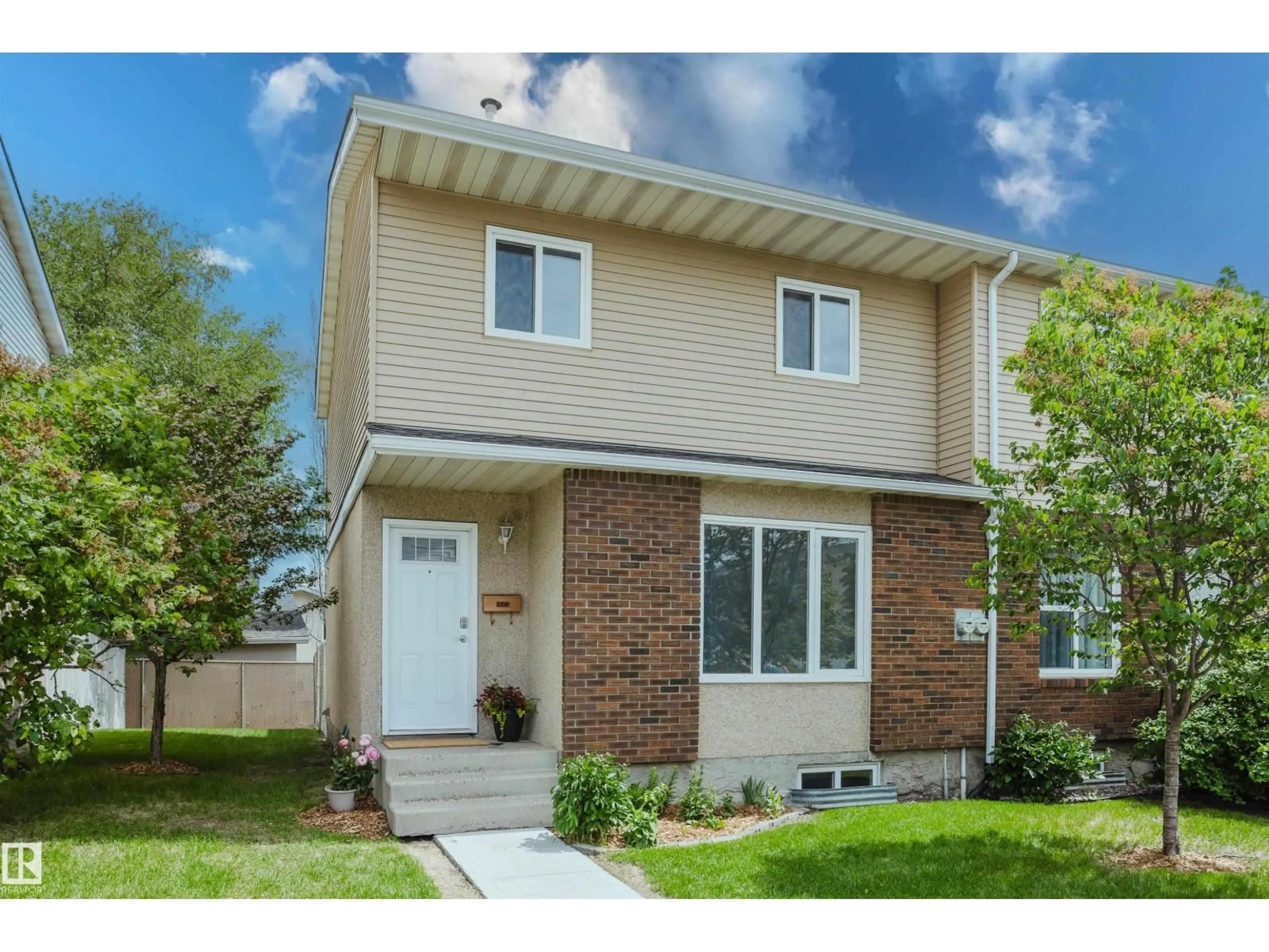 Home with vinyl exterior material, street for 16475 115 ST, Edmonton Alberta T5X5E8