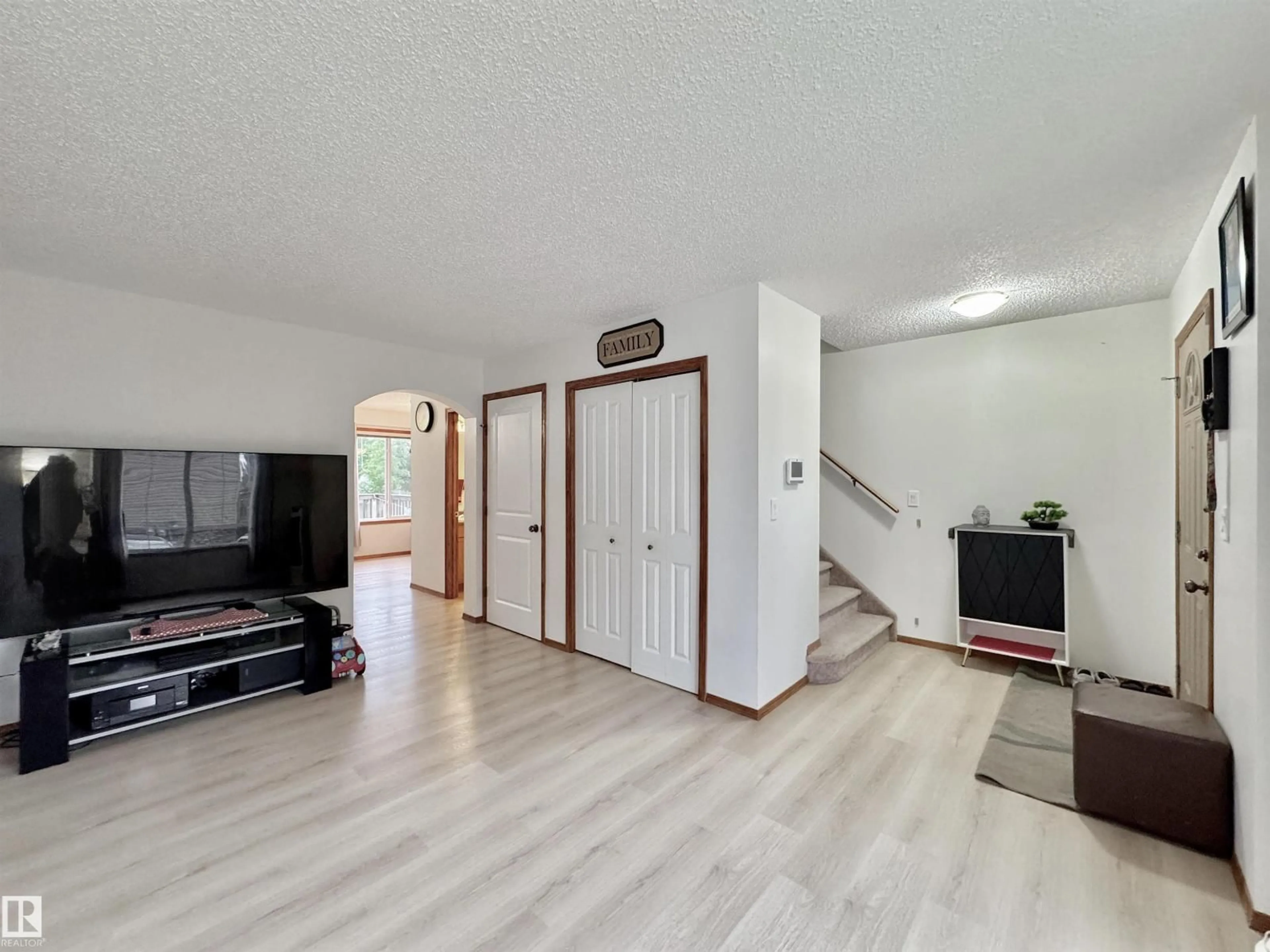 Living room with furniture, wood/laminate floor for 320 SPRUCE RIDGE RD, Spruce Grove Alberta T7X0H5
