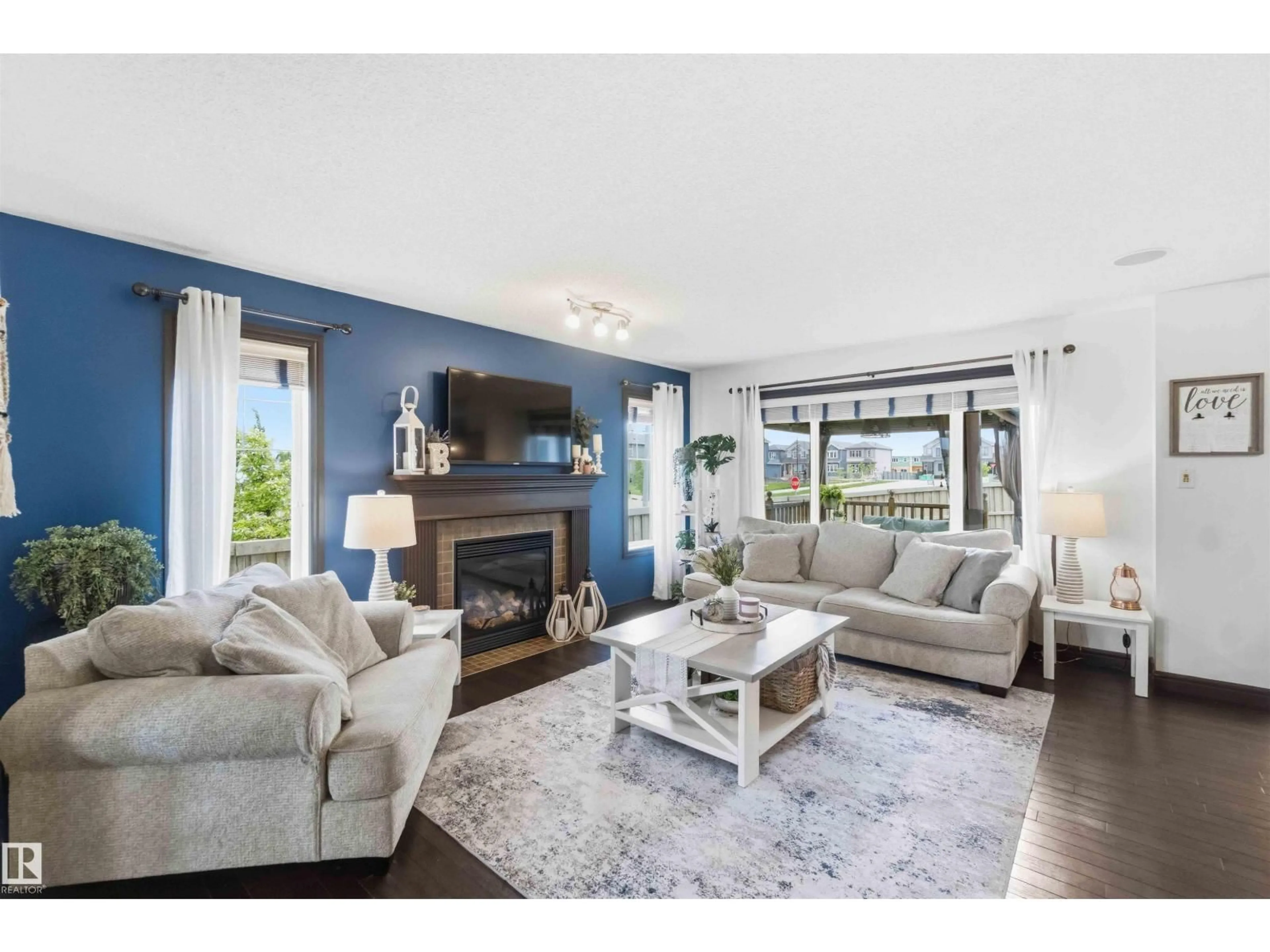 Living room with furniture, wood/laminate floor for 2 SONORA, Fort Saskatchewan Alberta T8L0G1