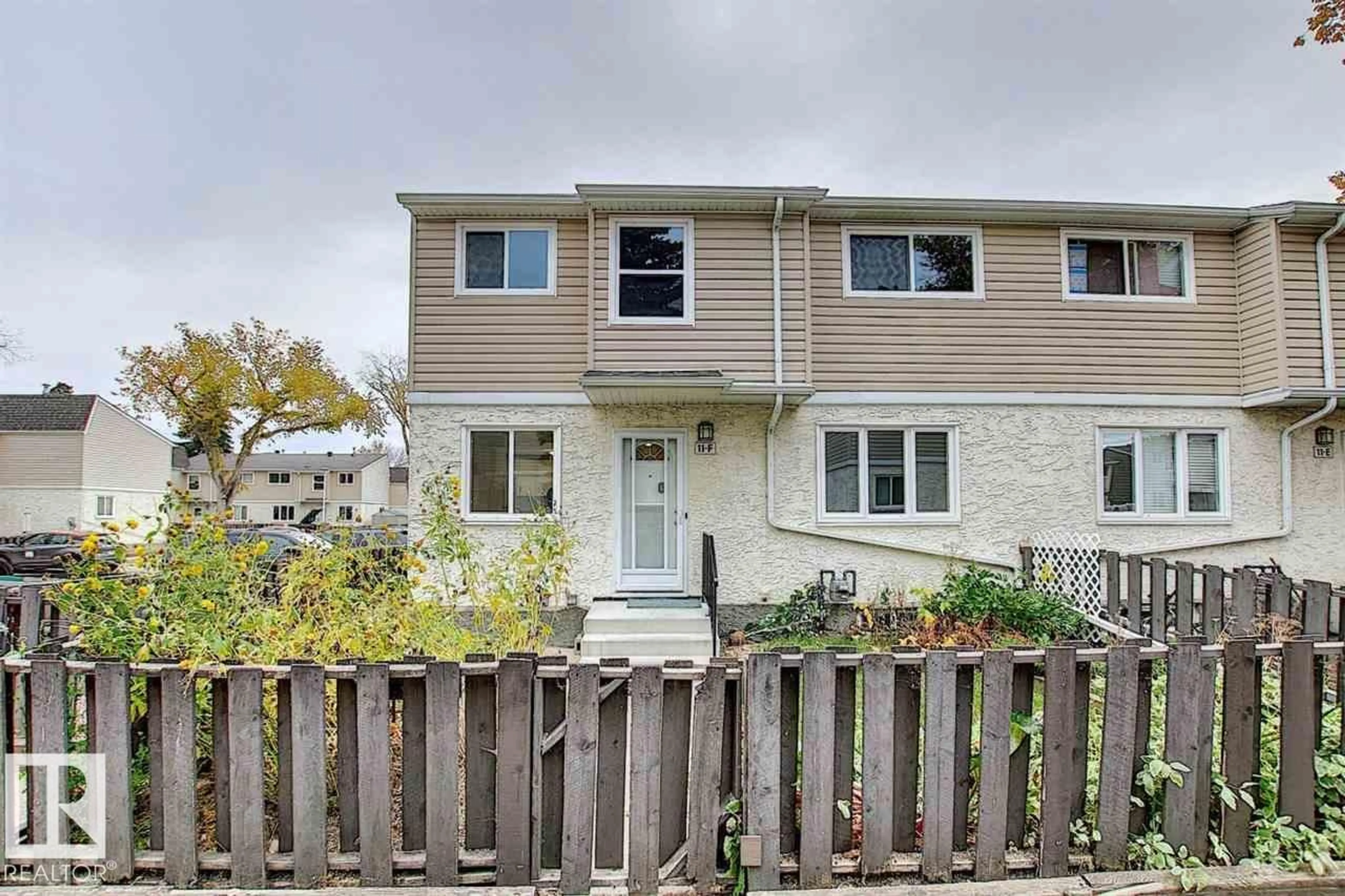Home with vinyl exterior material, street for NW - 11F CLAREVIEW VG, Edmonton Alberta T5A3P2