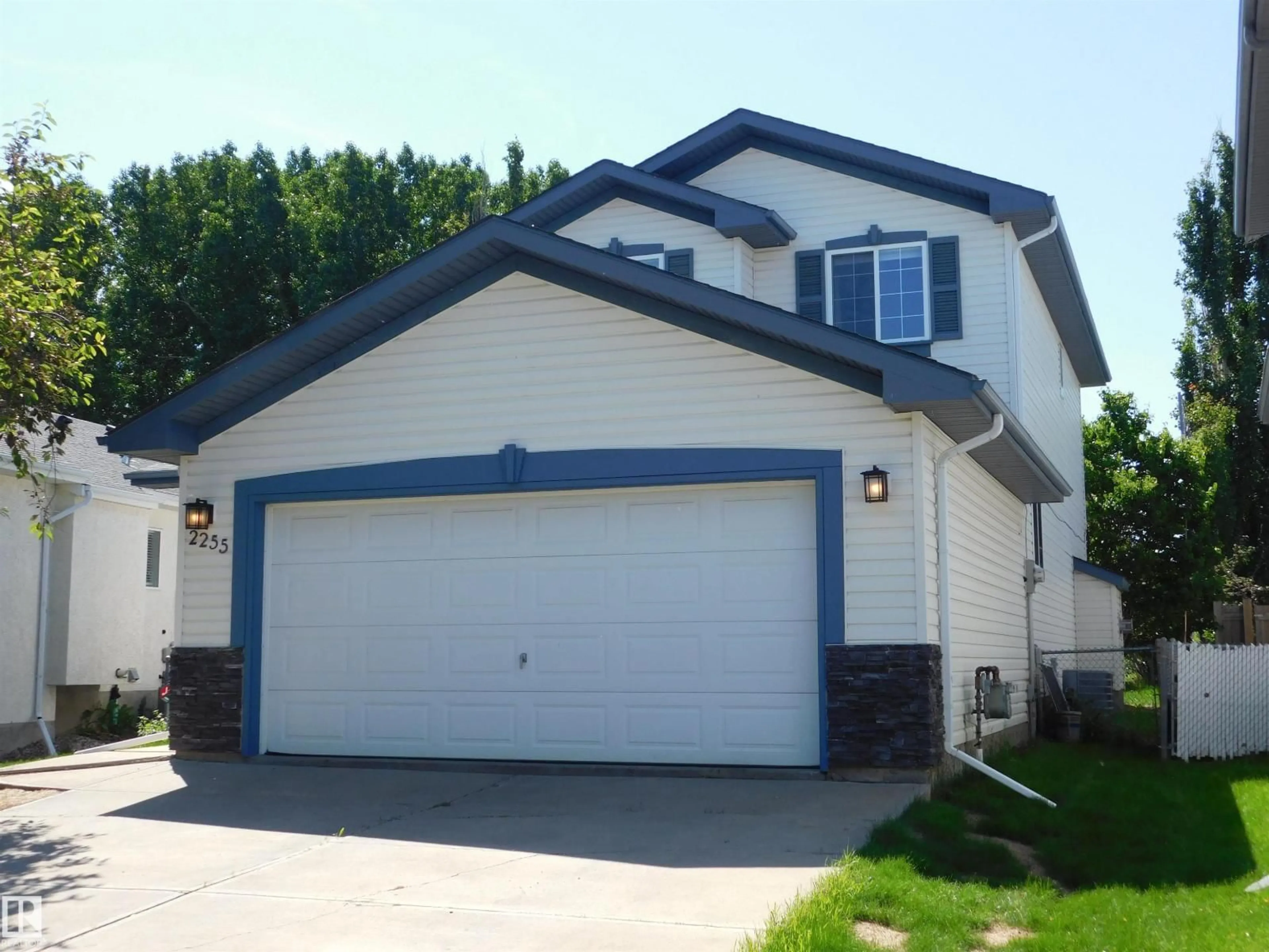 Home with vinyl exterior material, street for NW - 2255 BRENNAN CO, Edmonton Alberta T5T6M3