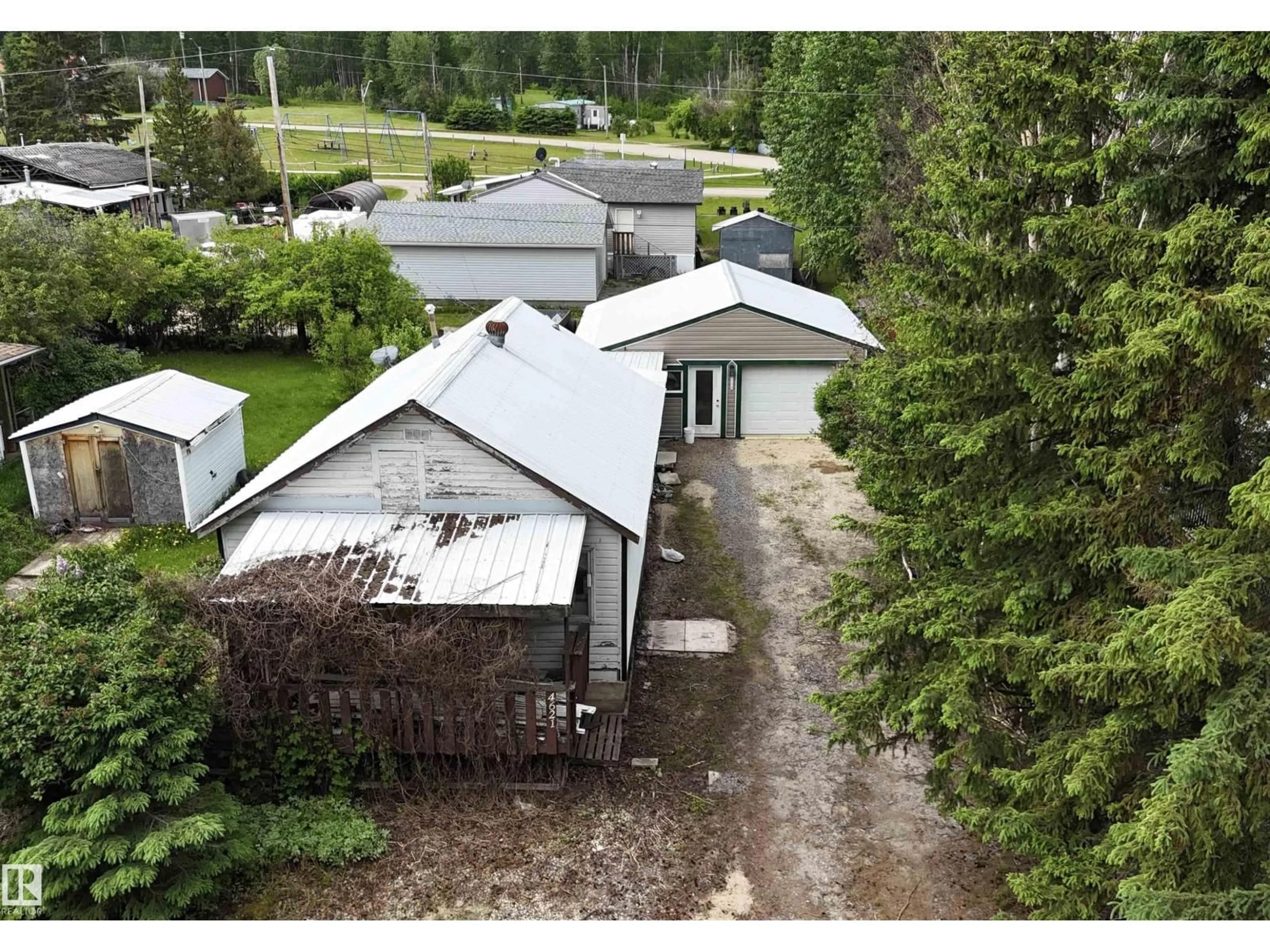 A pic from outside/outdoor area/front of a property/back of a property/a pic from drone, unknown for 4621 54 AV, Lodgepole Alberta T0E1K0