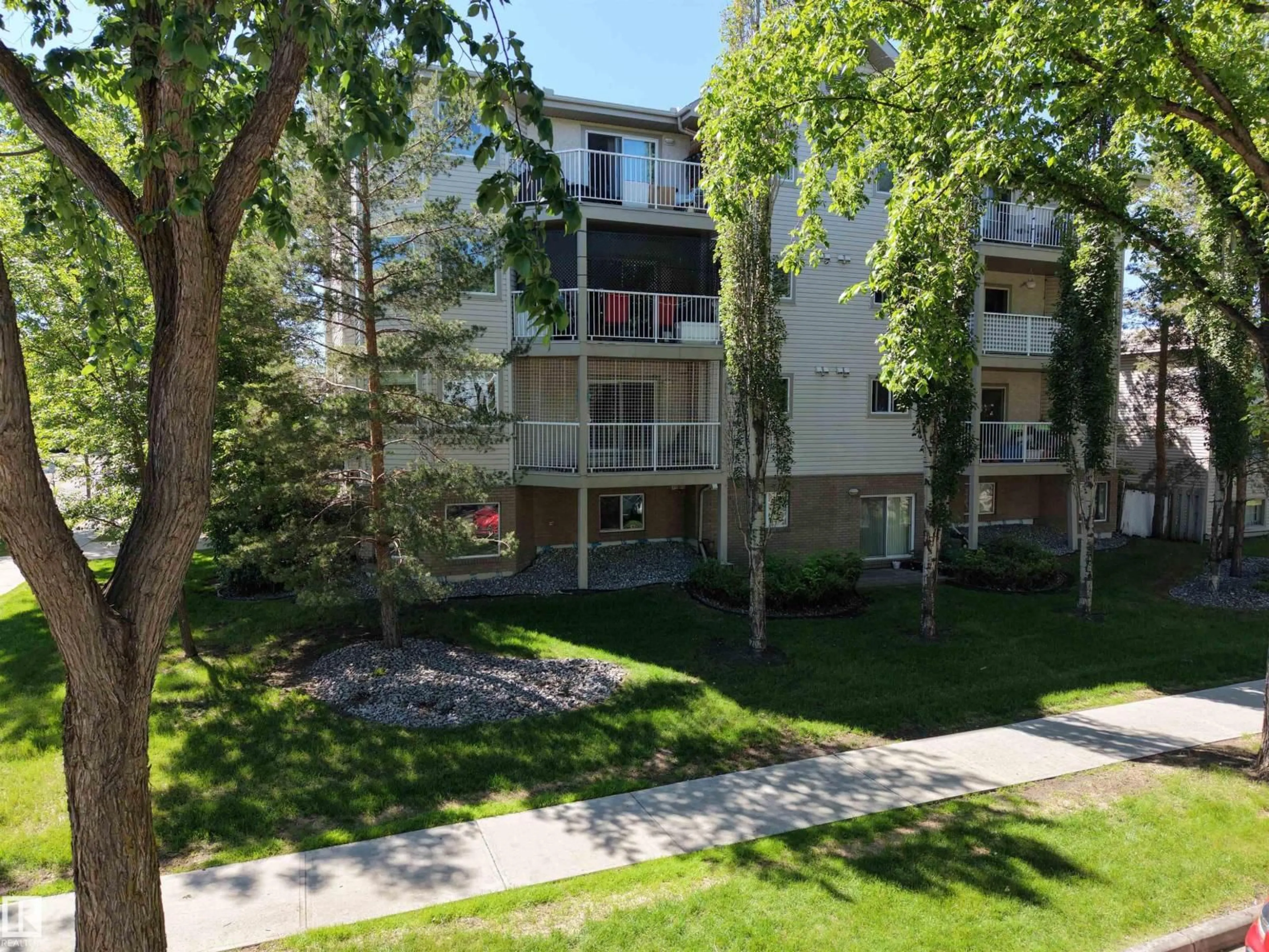A pic from outside/outdoor area/front of a property/back of a property/a pic from drone, street for 201 - 11408 108 AV, Edmonton Alberta T5H4R5