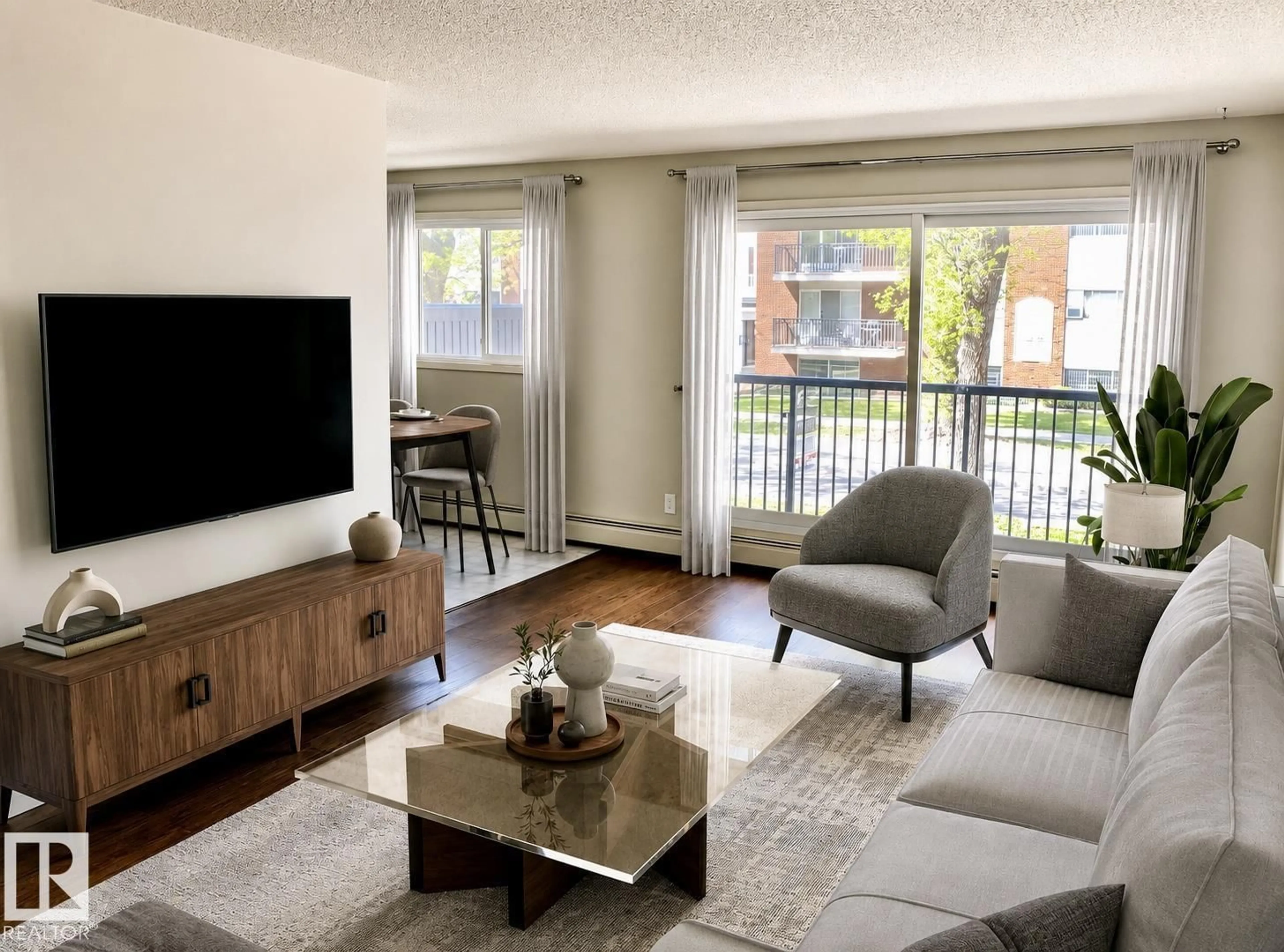 Living room with furniture, wood/laminate floor for #201 - 10149 83 AV, Edmonton Alberta T6E2C5