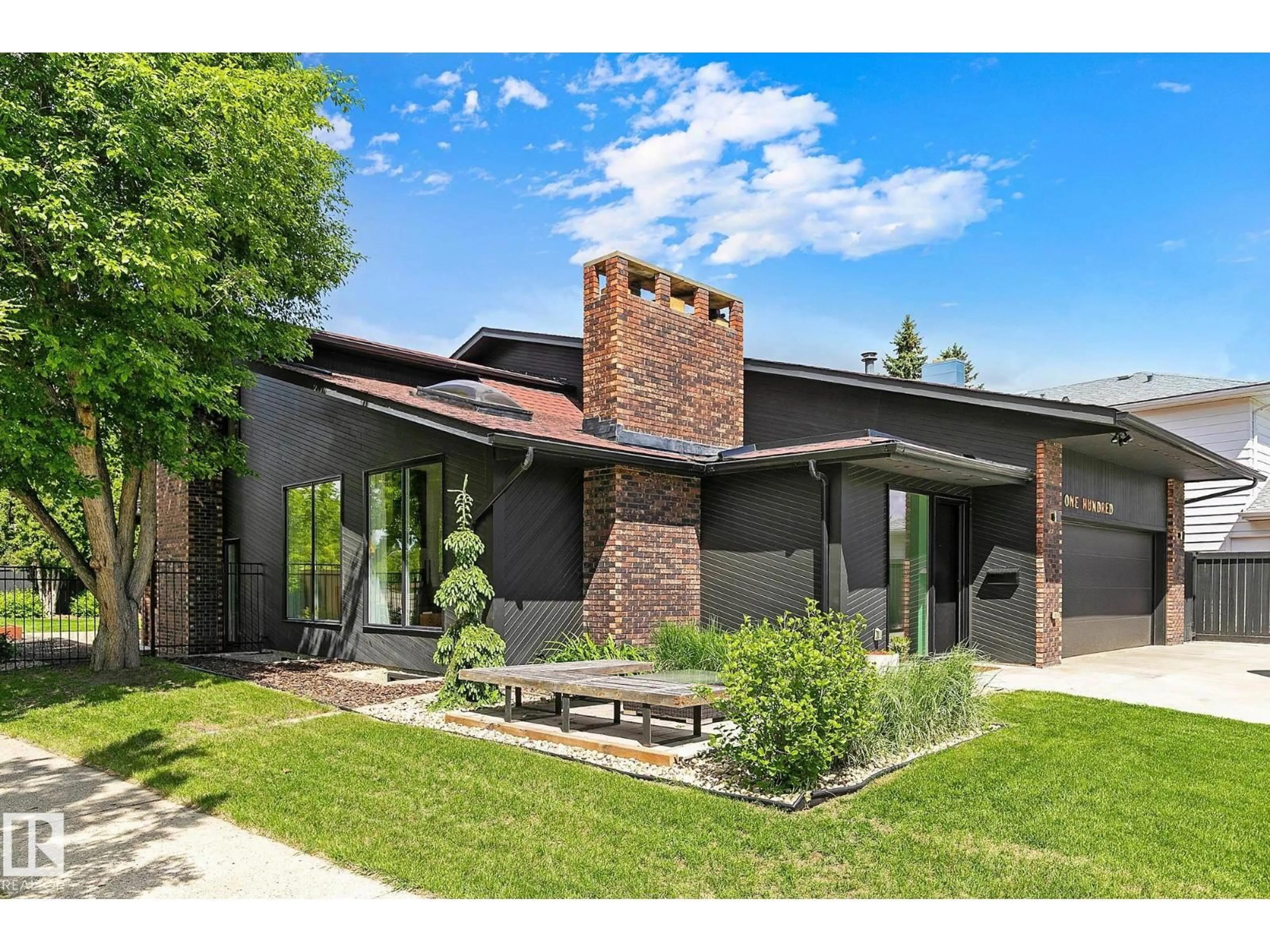 Home with brick exterior material, street for 100 WOLF WILLOW CR, Edmonton Alberta T5T1T2