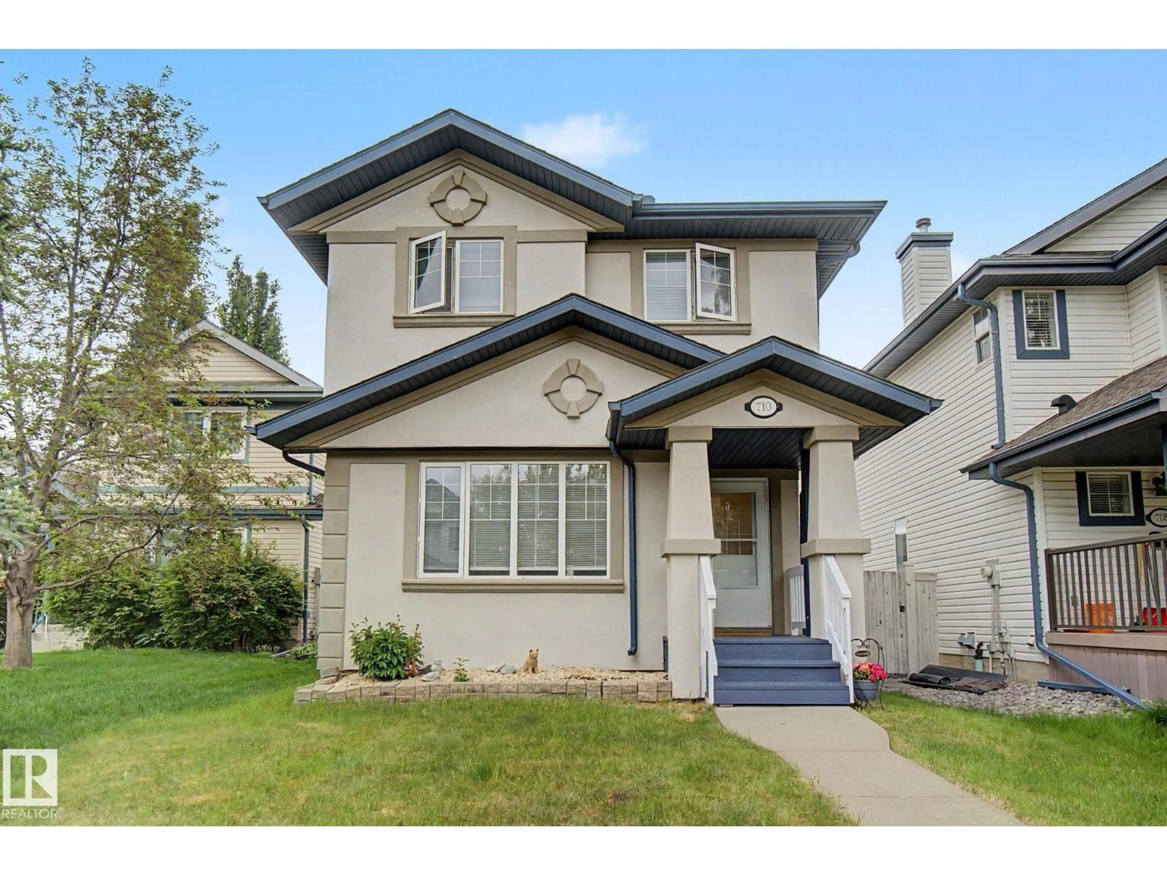 Home with vinyl exterior material, street for NW - 710 GLENWRIGHT CO, Edmonton Alberta T5T6K5
