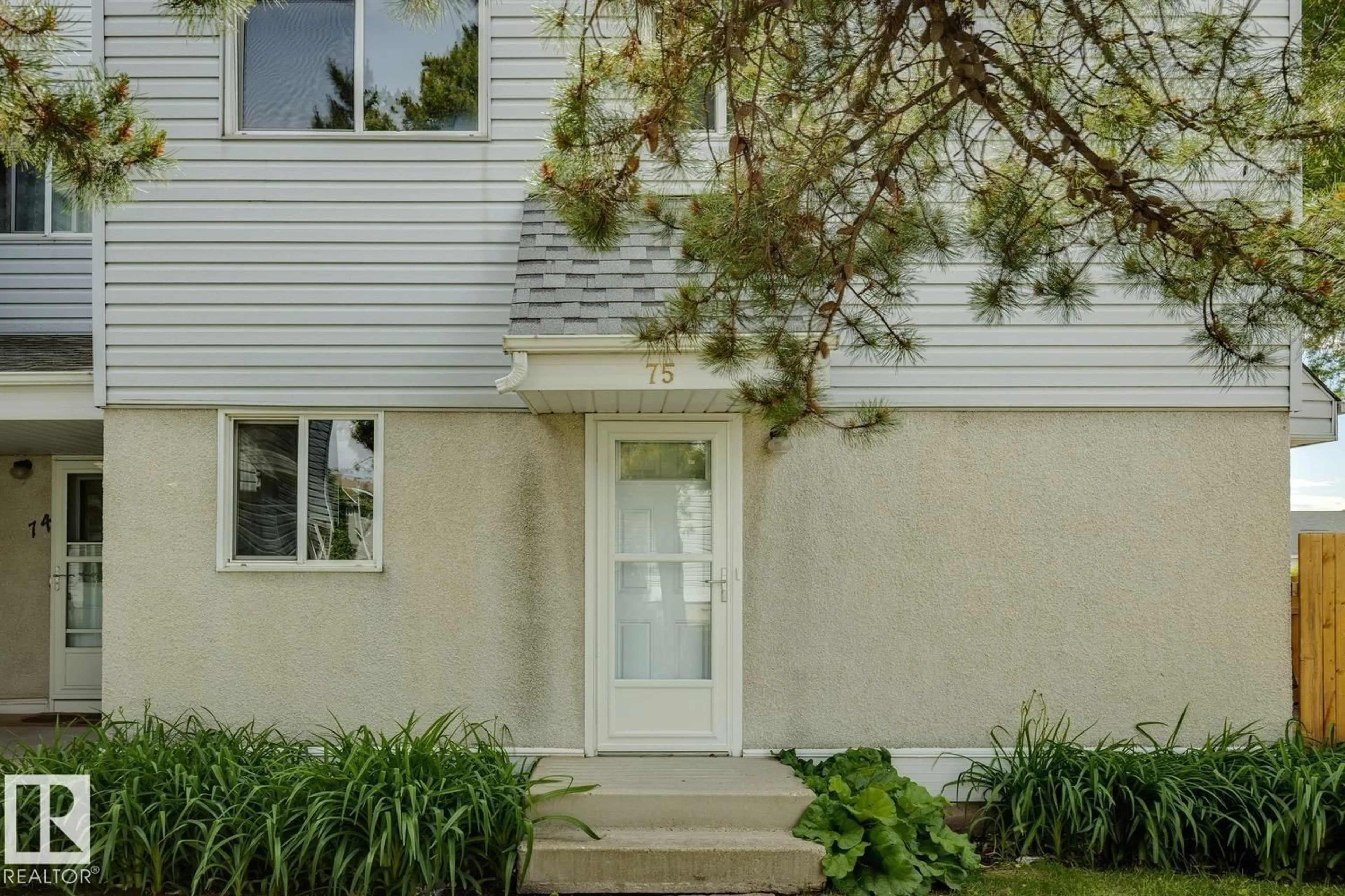 Home with vinyl exterior material, street for 75 MCLEOD PL, Edmonton Alberta T5A3A8