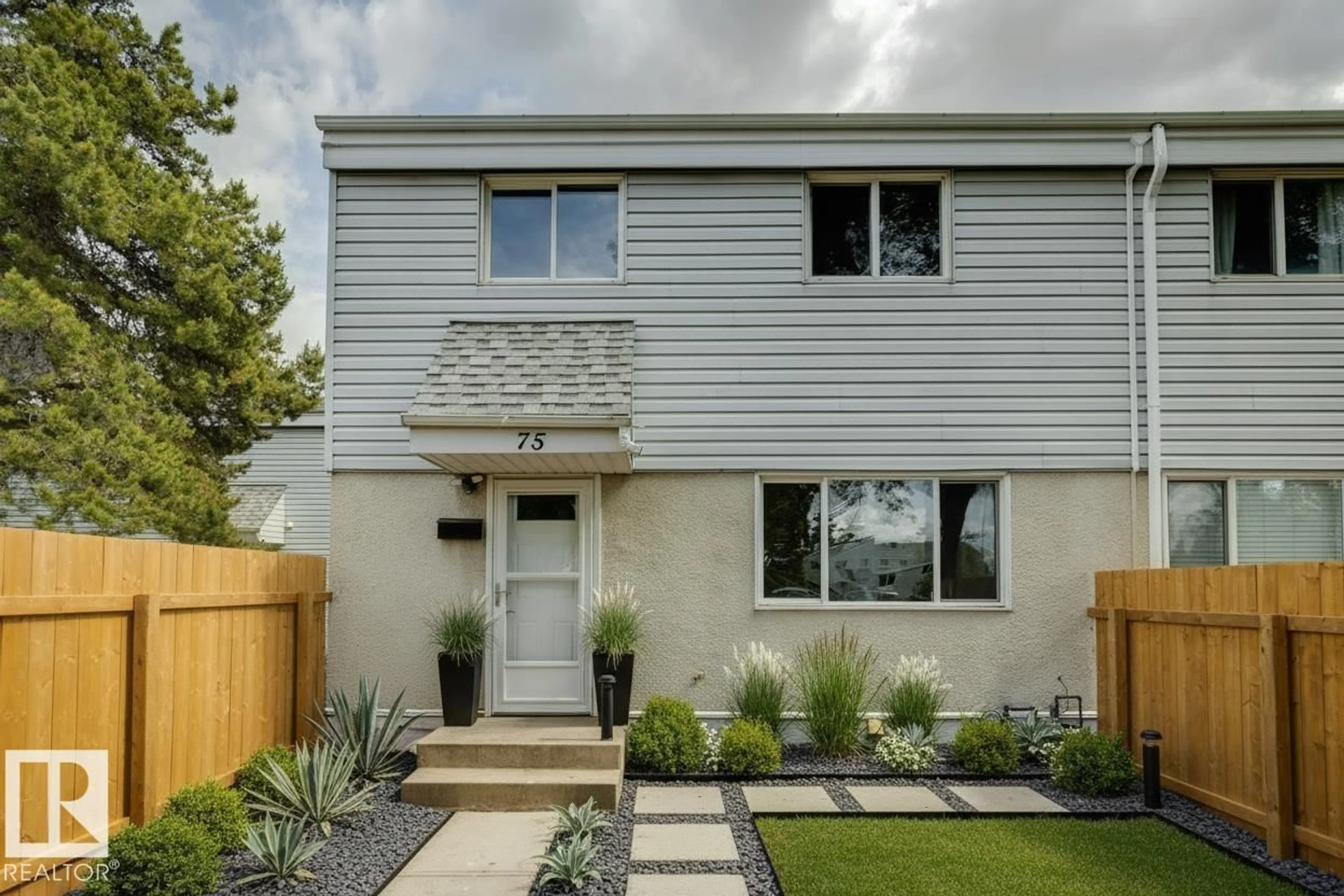 Home with vinyl exterior material, street for 75 MCLEOD PL, Edmonton Alberta T5A3A8