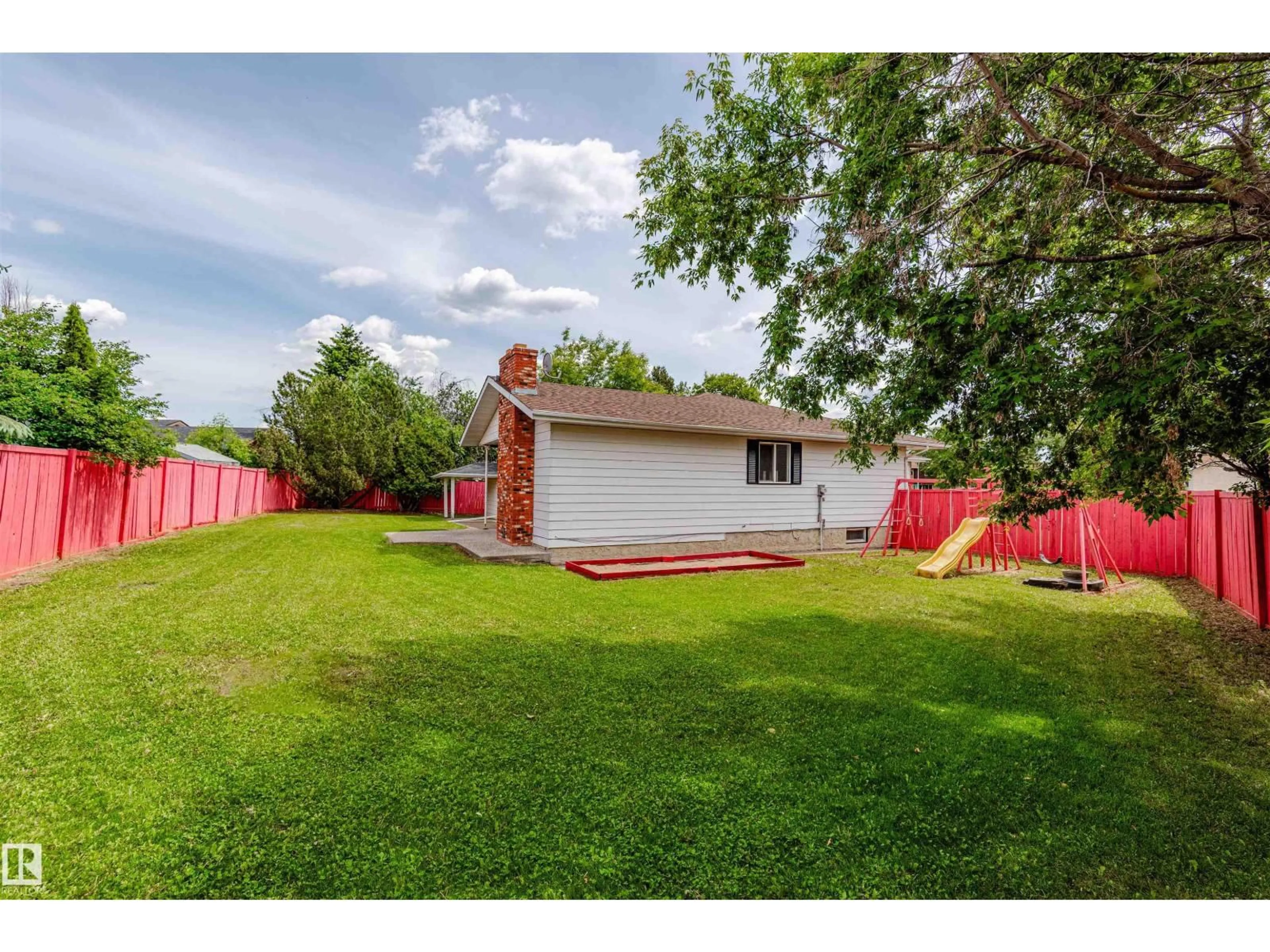 A pic from outside/outdoor area/front of a property/back of a property/a pic from drone, unknown for NW - 16524 116 ST, Edmonton Alberta T5X3T8