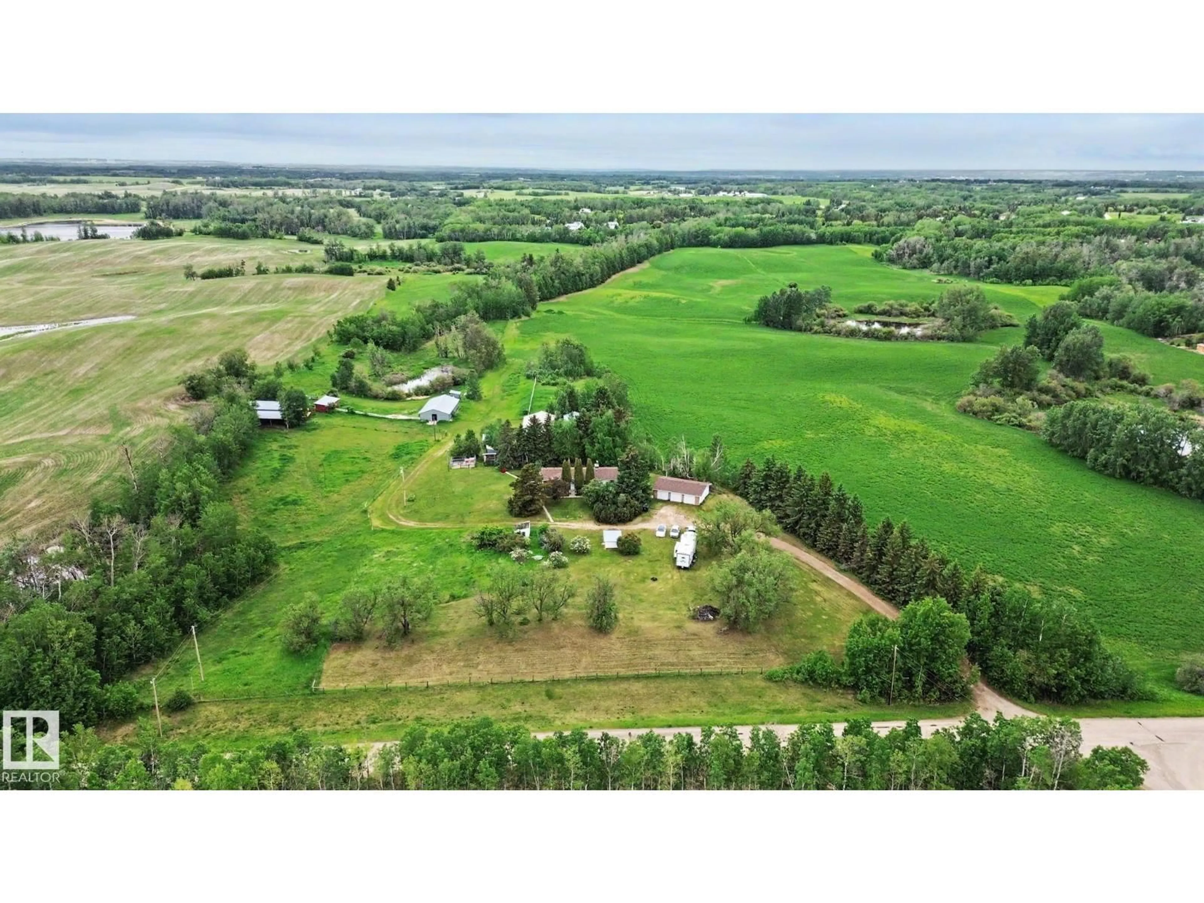 A pic from outside/outdoor area/front of a property/back of a property/a pic from drone, unknown for 52430 RGE ROAD 21, Rural Parkland County Alberta T7Y2H1