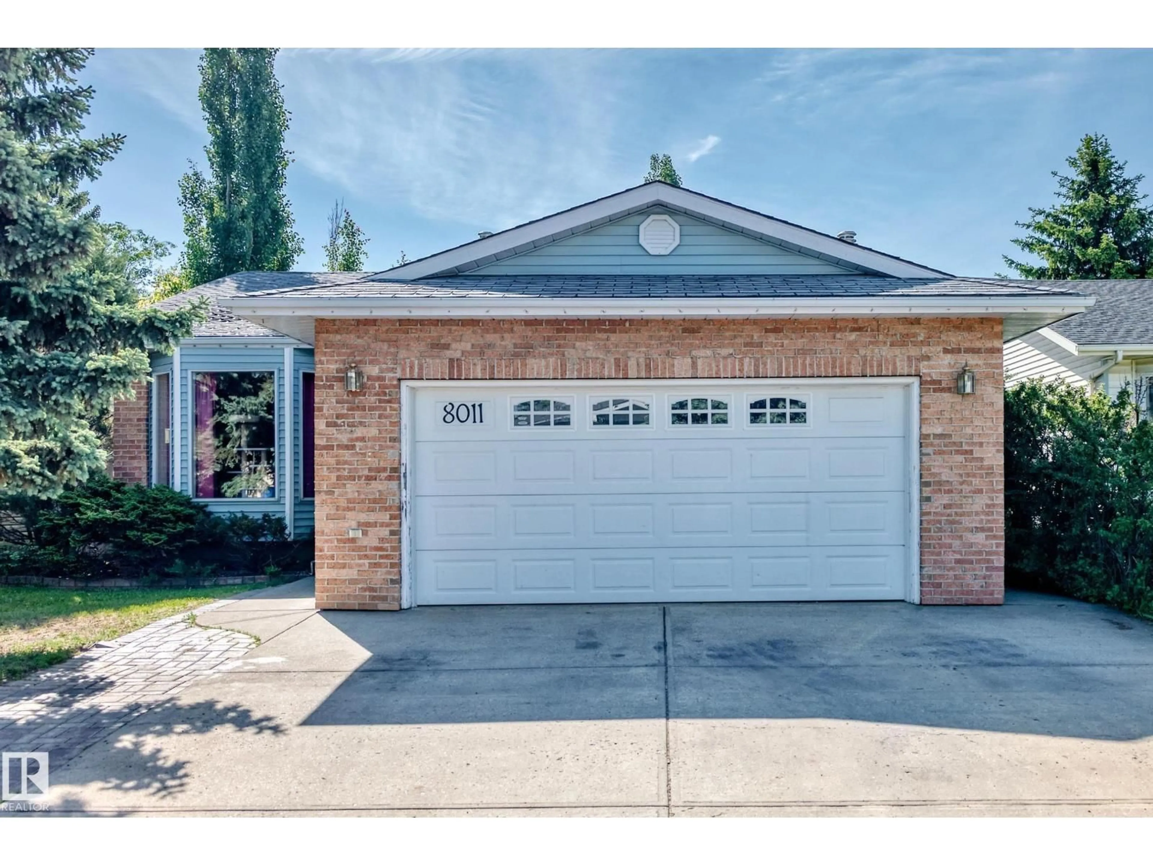 Home with brick exterior material, street for NW - 8011 188 ST, Edmonton Alberta T5T5B1