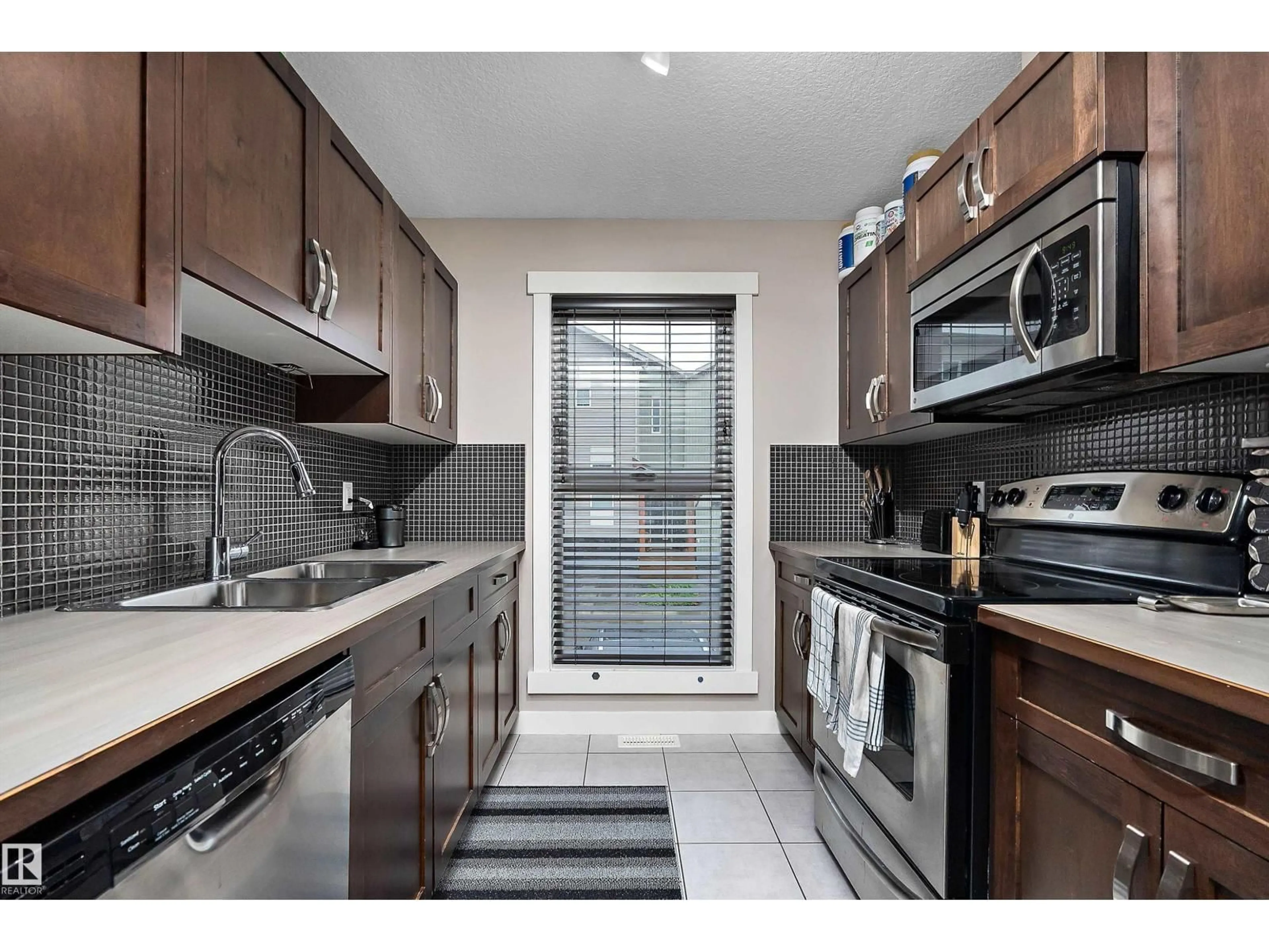Standard kitchen, ceramic/tile floor for 160 SOUTHFORK DR, Leduc Alberta T9E0X1