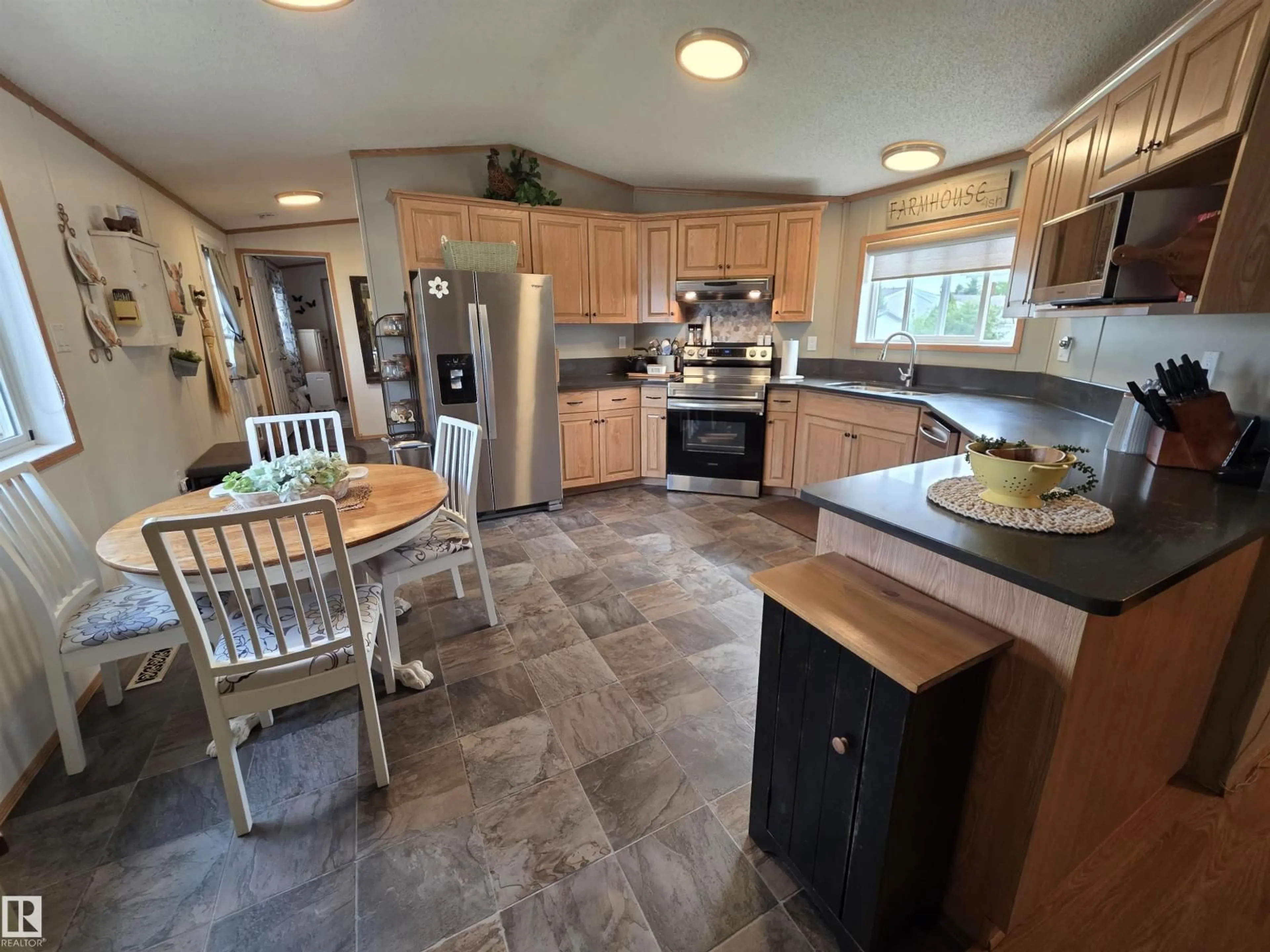 Open concept kitchen, ceramic/tile floor for 88B - 3400 48 ST, Stony Plain Alberta T7Z1S1