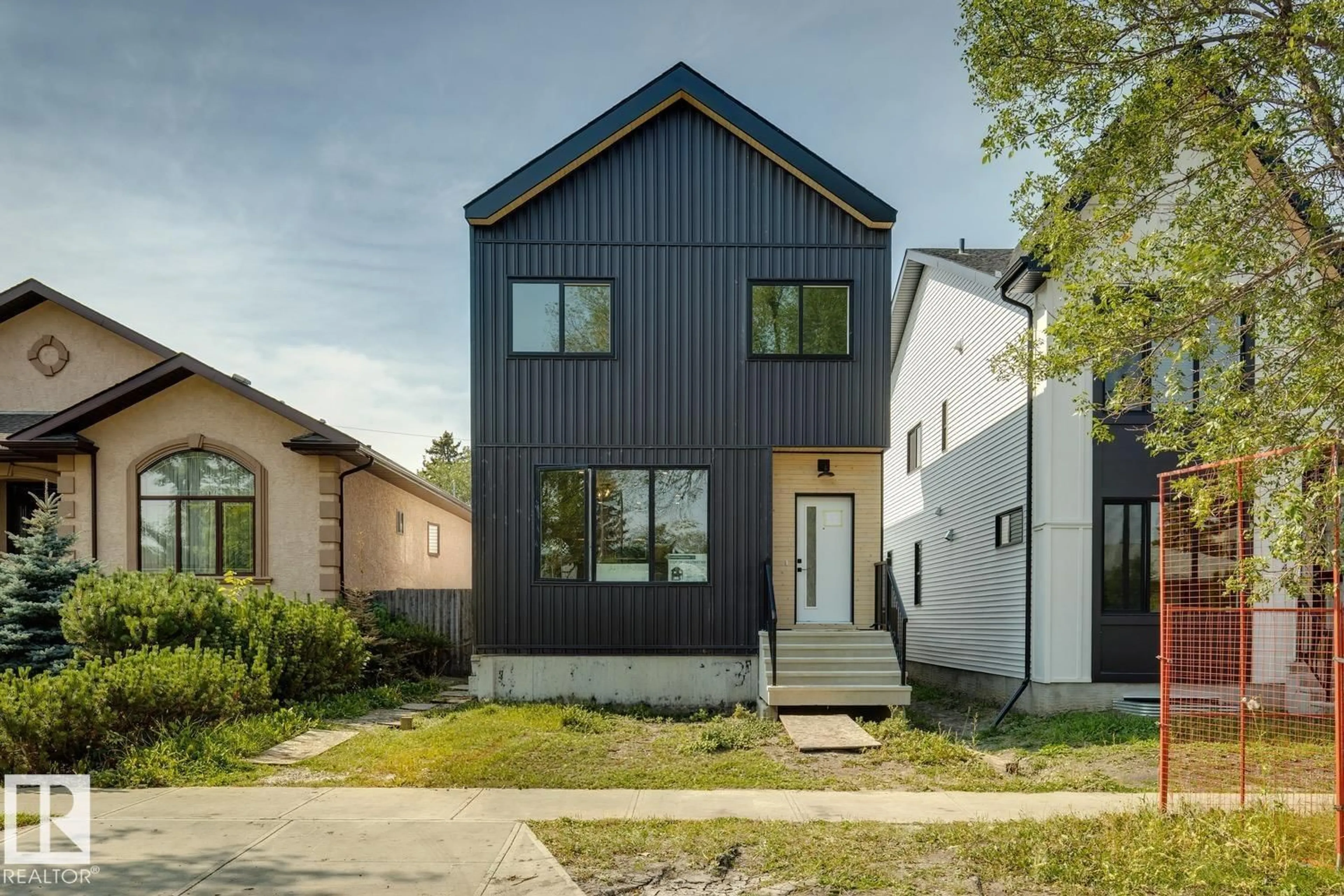 Home with brick exterior material, street for 11336 130 ST, Edmonton Alberta T5M1A2