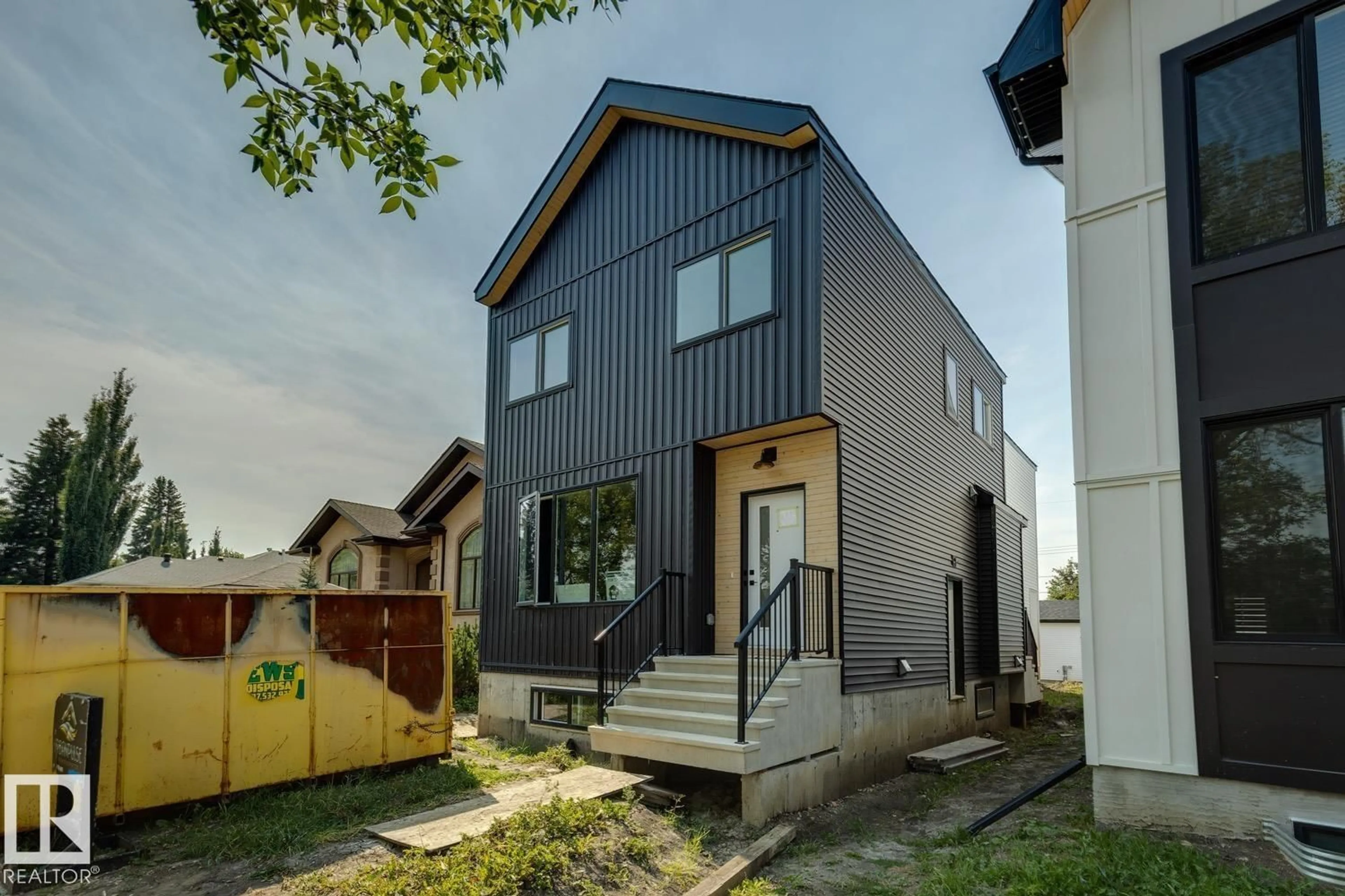 Home with brick exterior material, street for 11336 130 ST, Edmonton Alberta T5M1A2