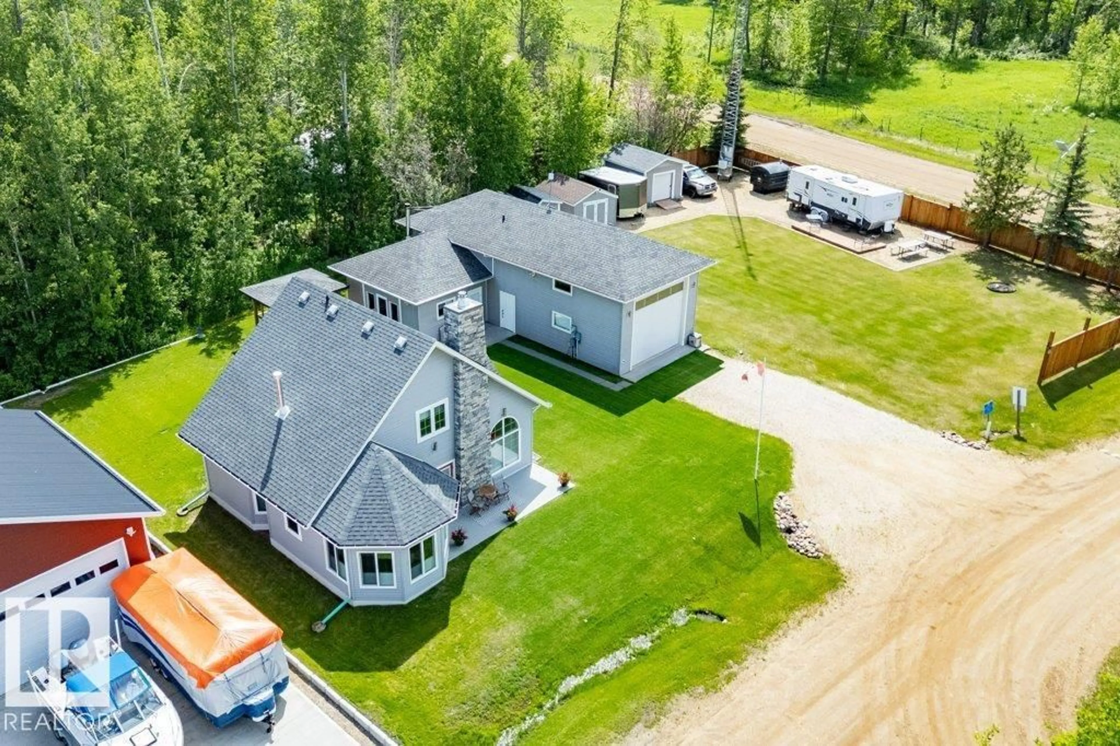 A pic from outside/outdoor area/front of a property/back of a property/a pic from drone, unknown for #86 - 160 PEACE RIVER AV, Rural Big Lakes M.D. Alberta T0G1J0