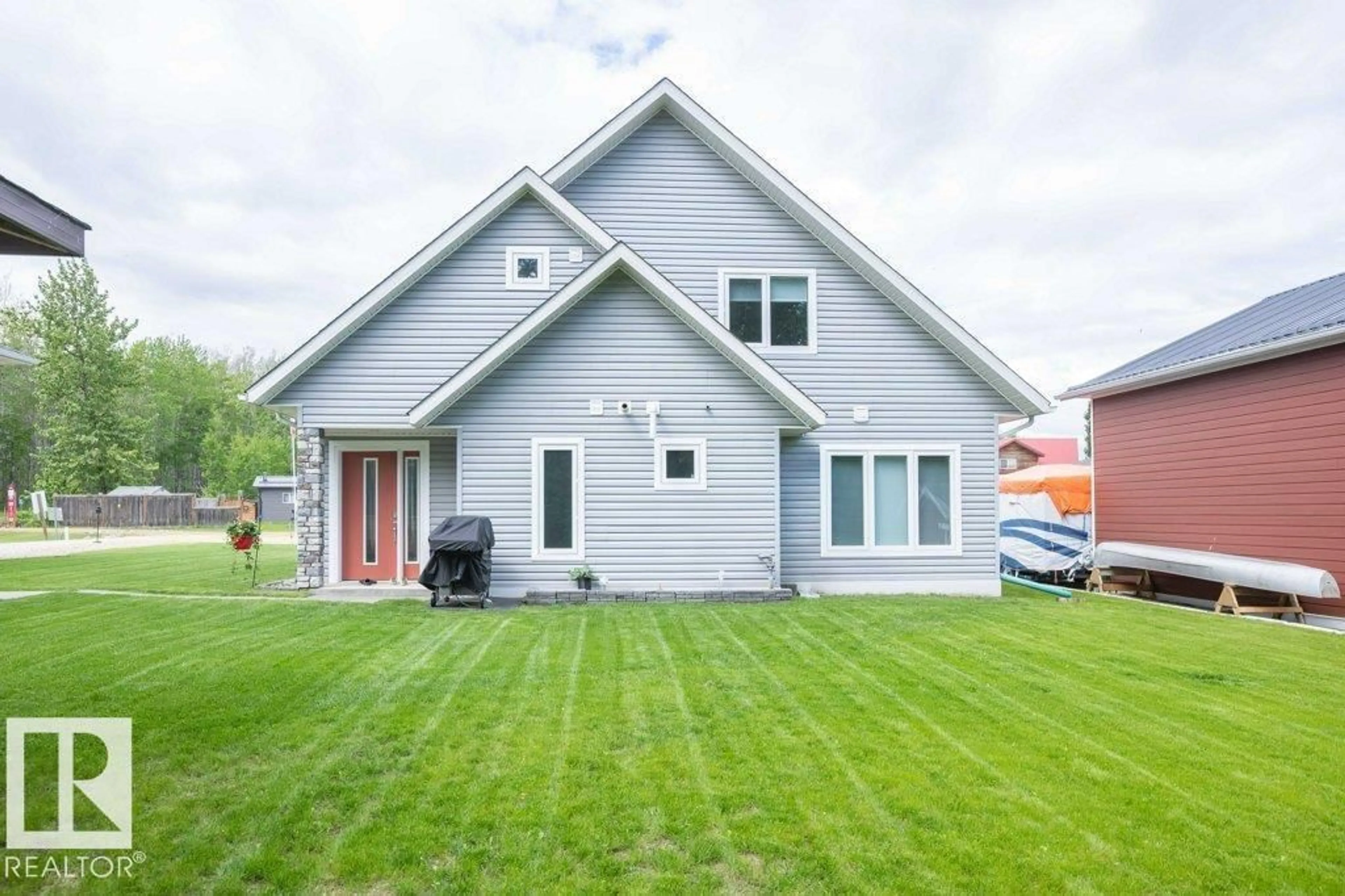 Home with vinyl exterior material, street for #86 - 160 PEACE RIVER AV, Rural Big Lakes M.D. Alberta T0G1J0