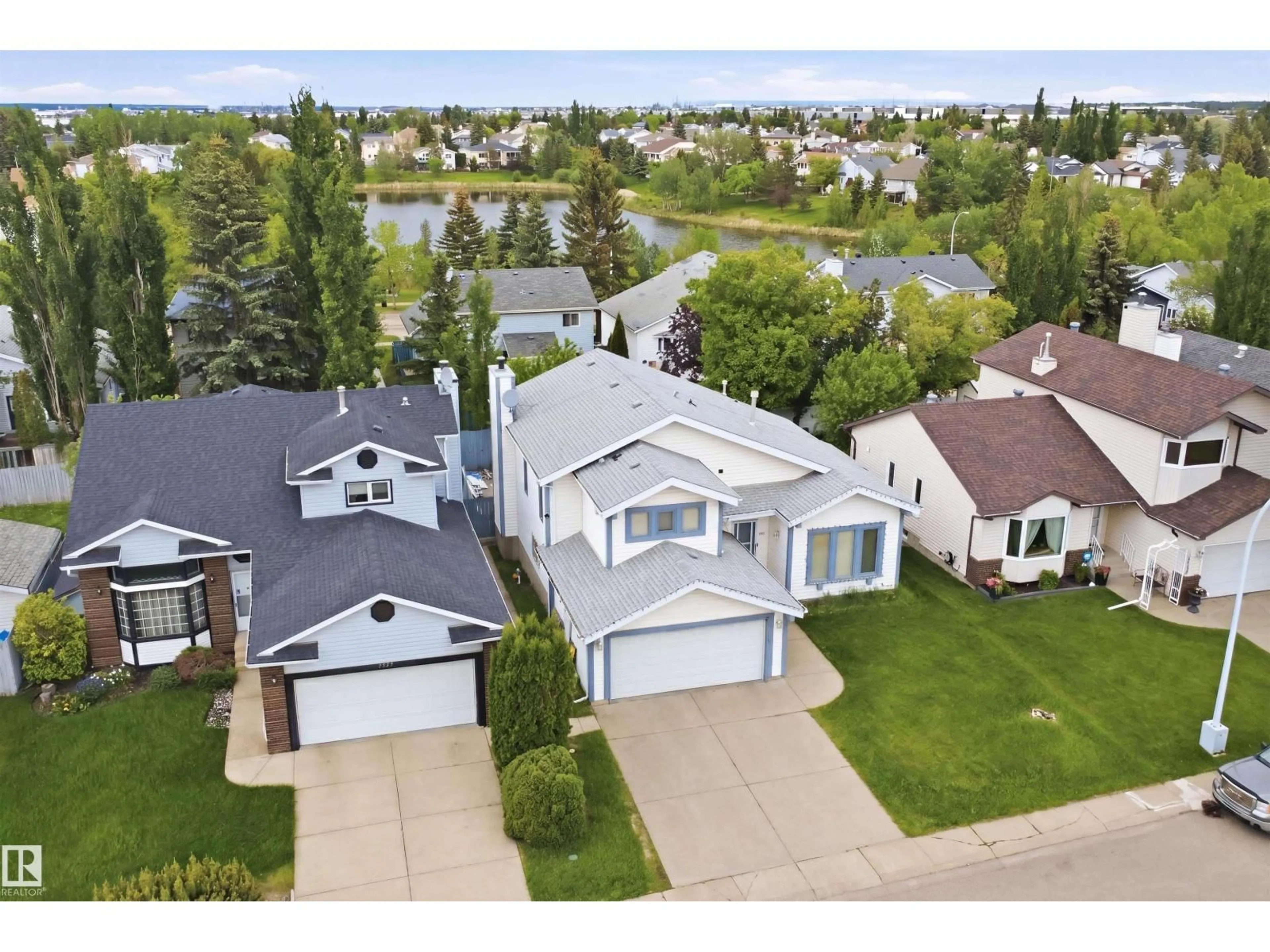 A pic from outside/outdoor area/front of a property/back of a property/a pic from drone, street for 3220 42A AV, Edmonton Alberta T6T1E5