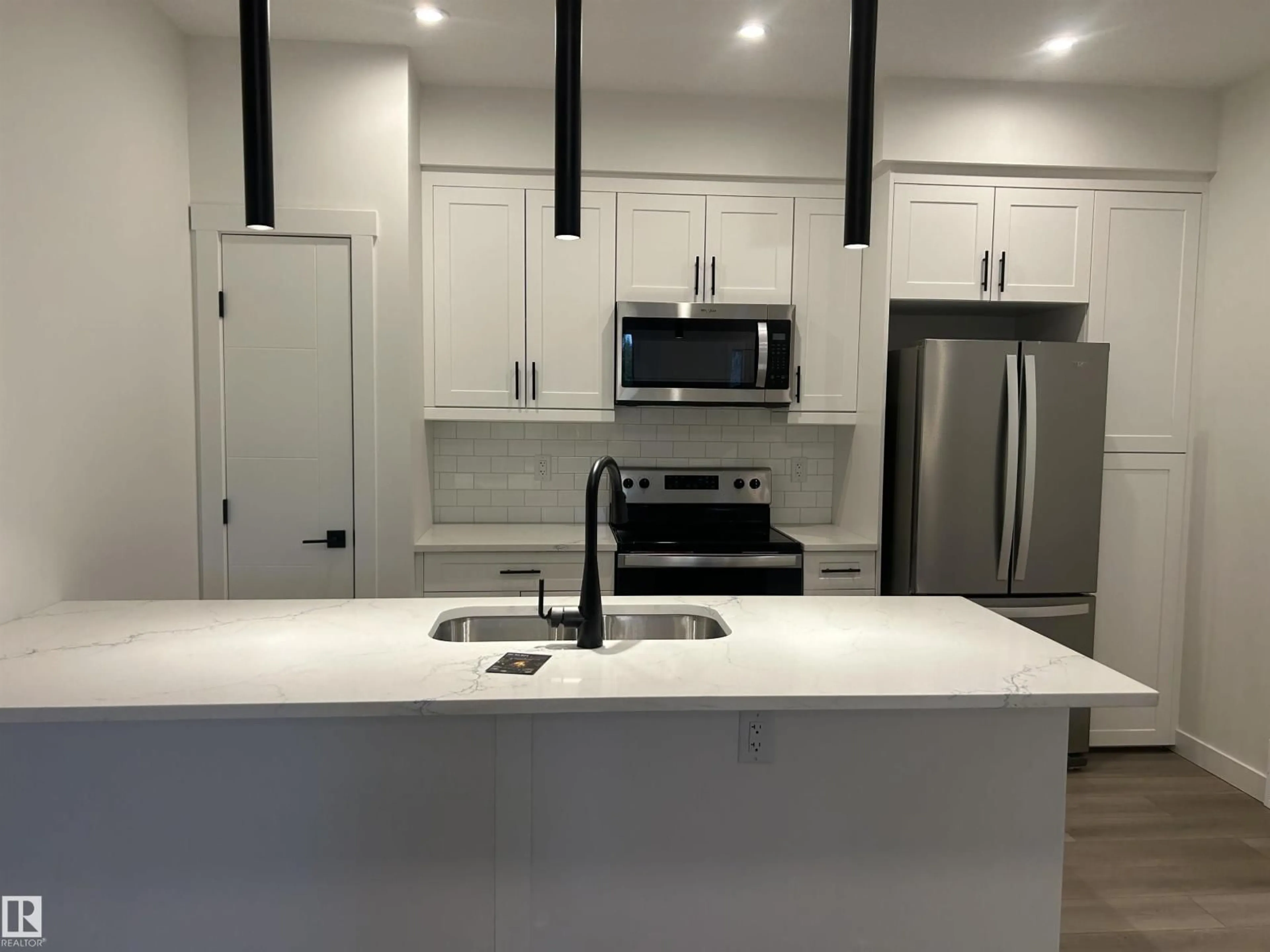 Open concept kitchen, unknown for NW - 11007 132 ST, Edmonton Alberta T5M1E4