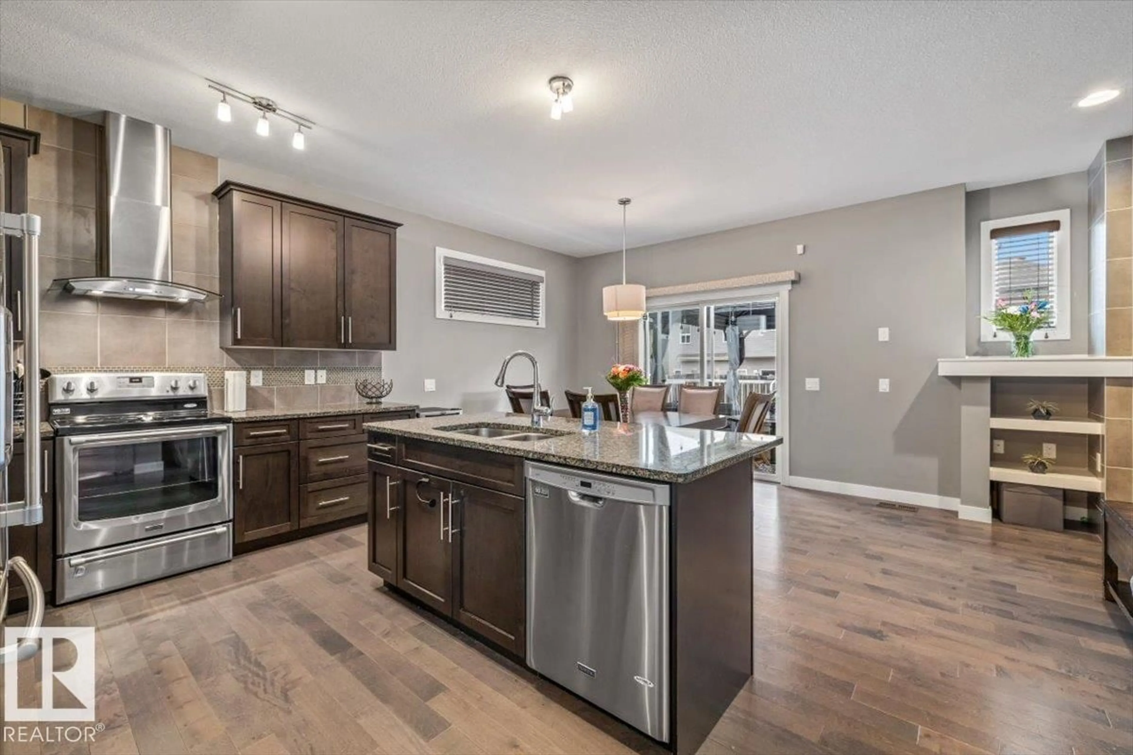 Open concept kitchen, unknown for 4105 171A AV, Edmonton Alberta T5Y0Z4