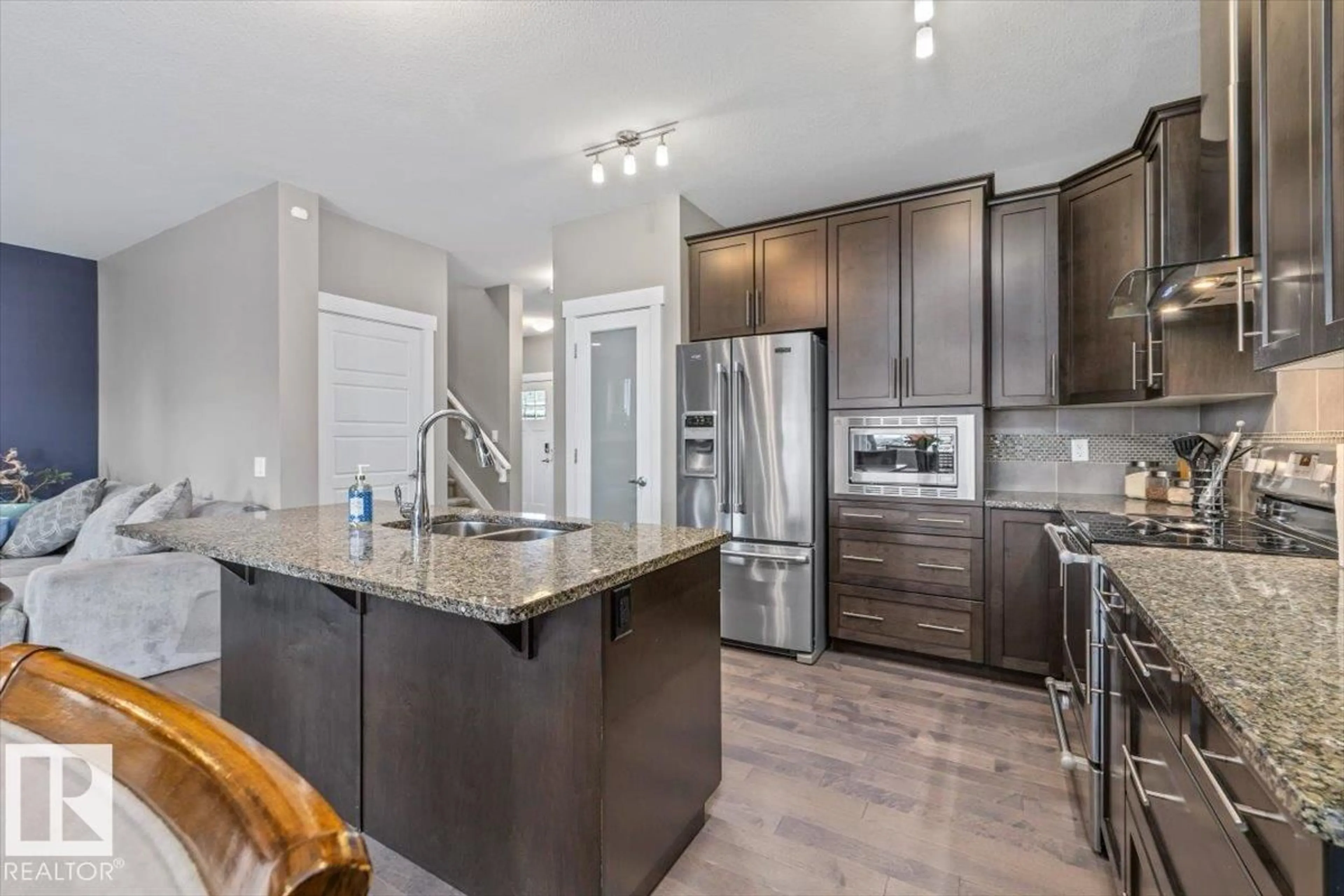 Open concept kitchen, unknown for 4105 171A AV, Edmonton Alberta T5Y0Z4
