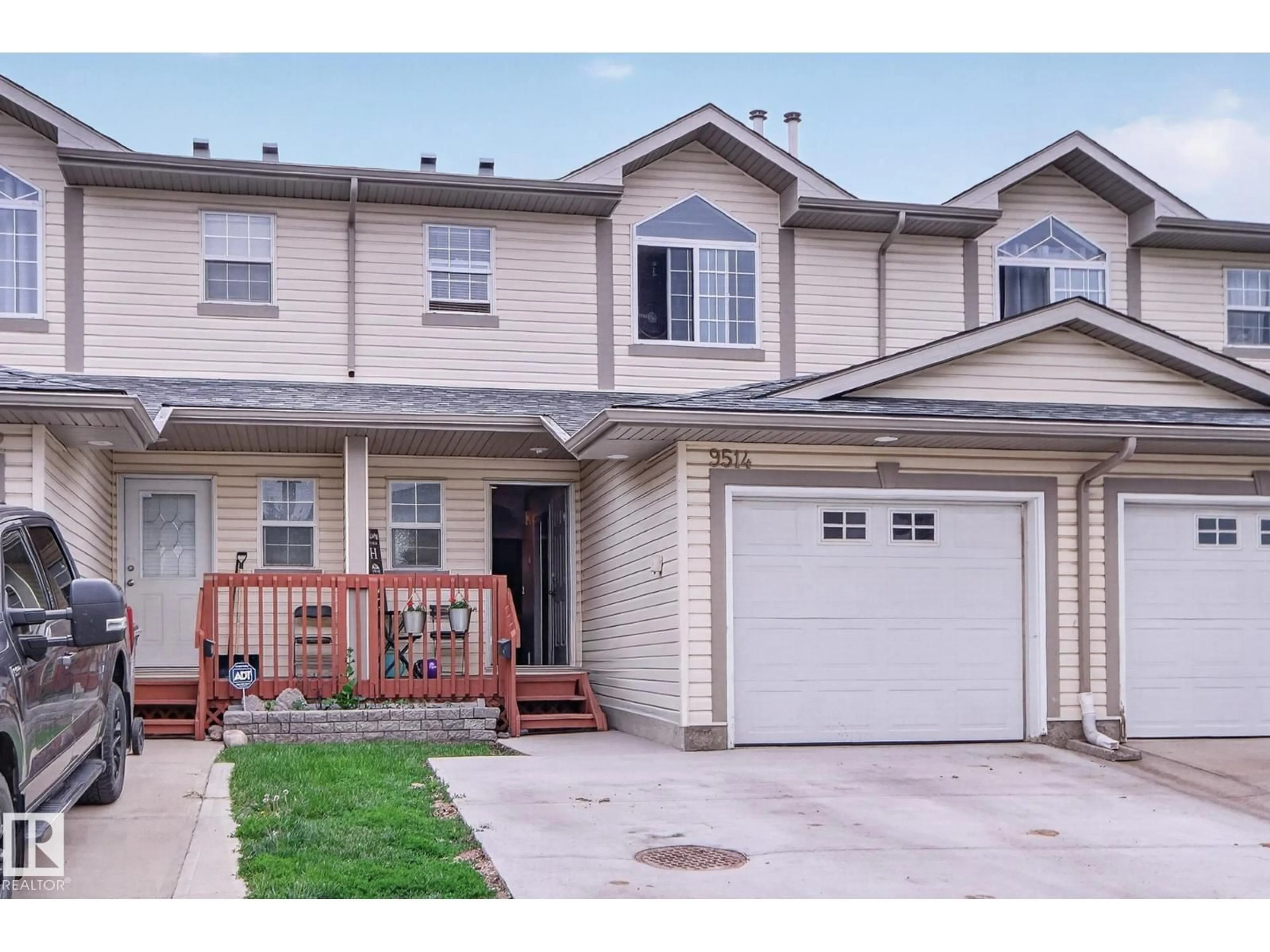 Home with vinyl exterior material, street for 9514 99 ST, Morinville Alberta T8R1T7
