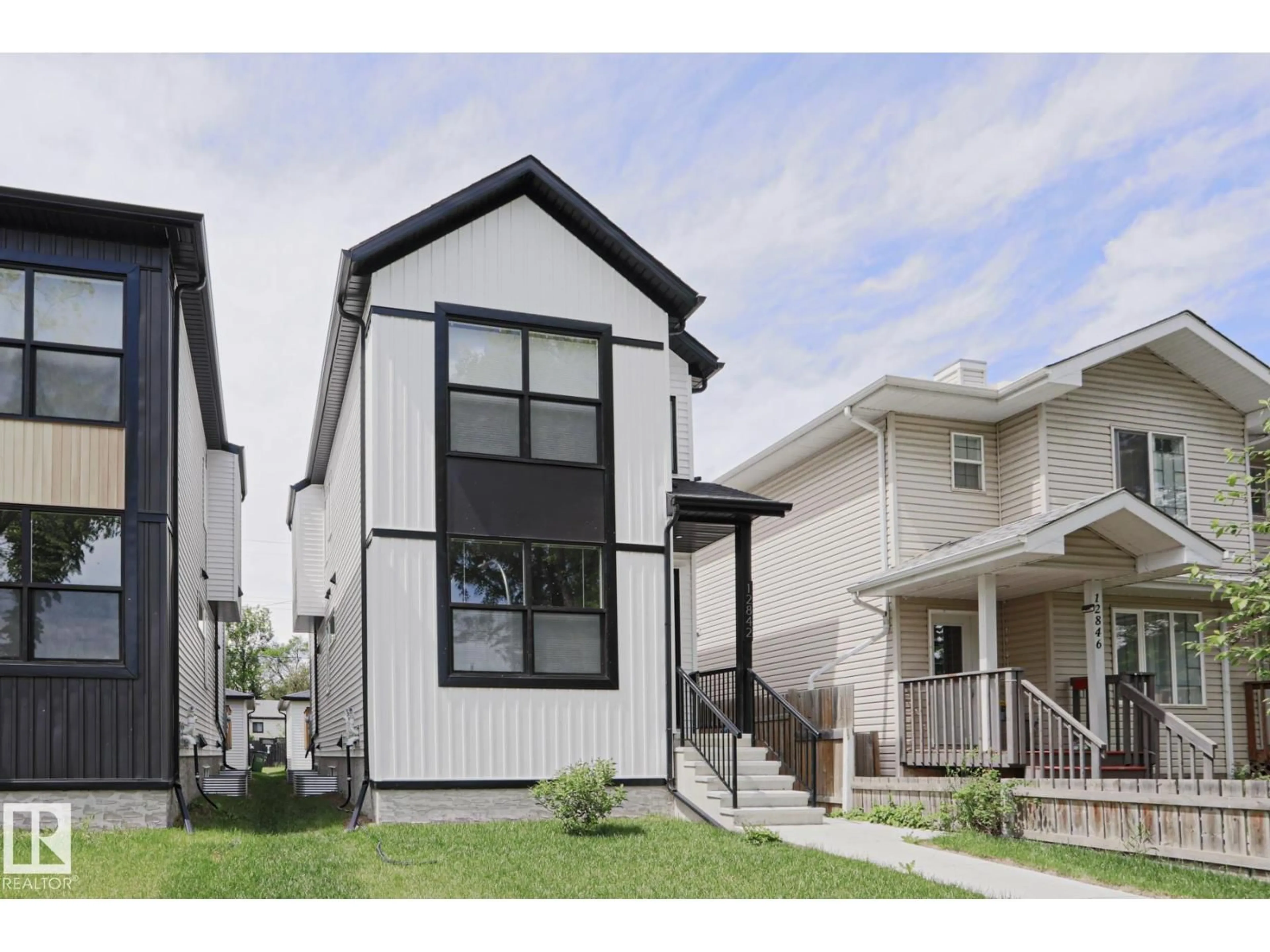 Home with vinyl exterior material, street for NW - 12842 121 ST, Edmonton Alberta T5L0A9
