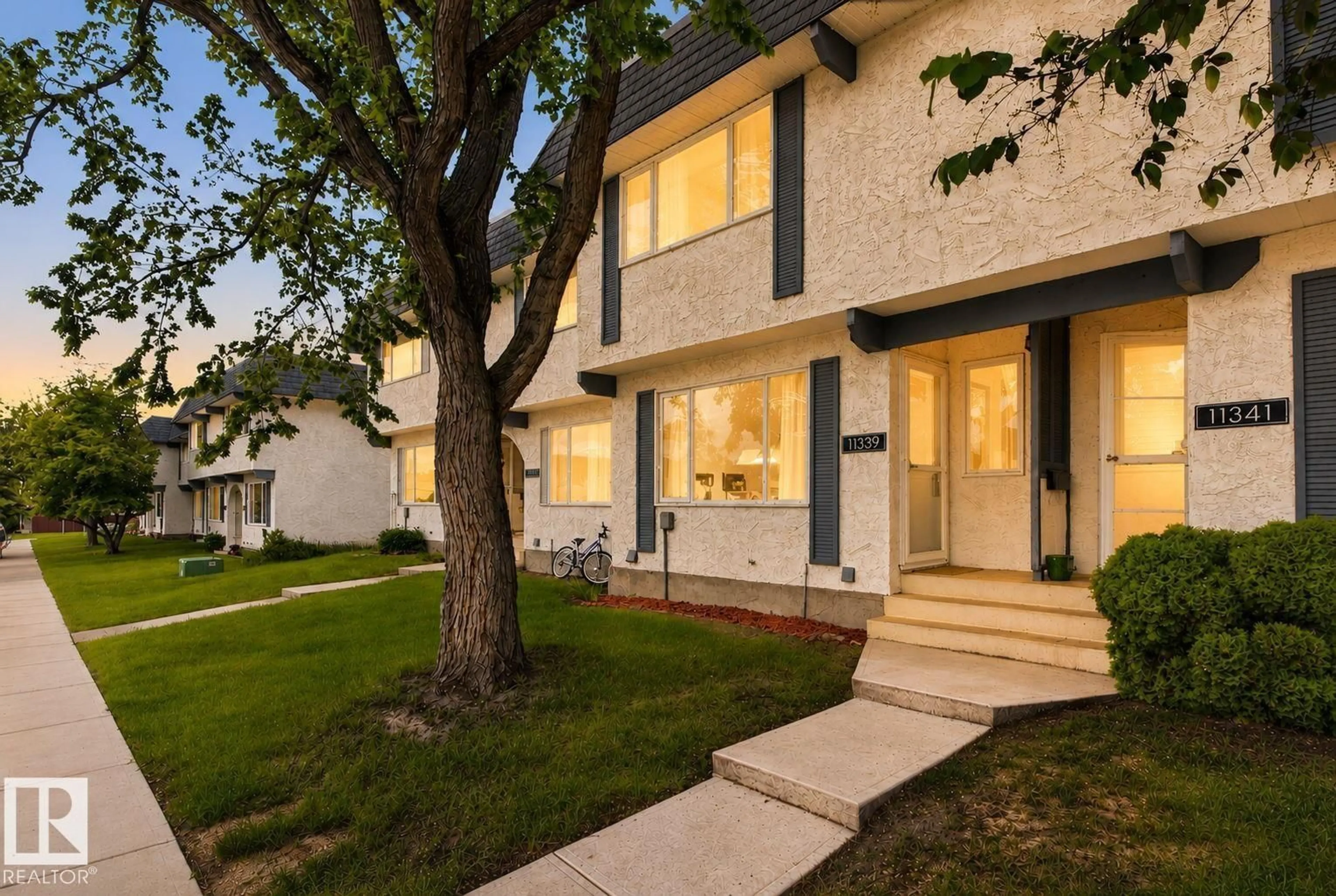 Home with brick exterior material, street for 11339 22 AV, Edmonton Alberta T6J4V8