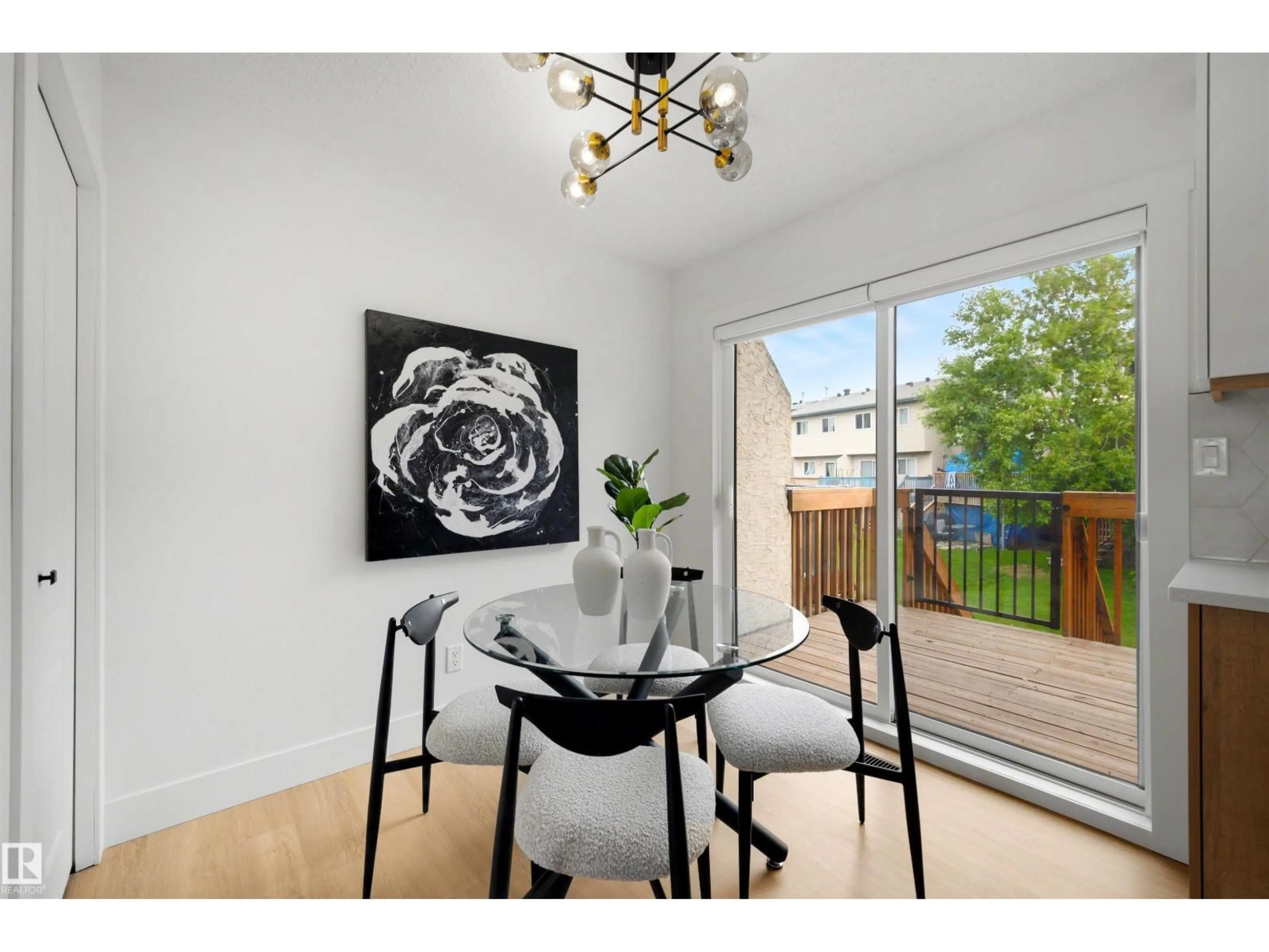 Dining room, wood/laminate floor for 12611 47 ST, Edmonton Alberta T5A5B1