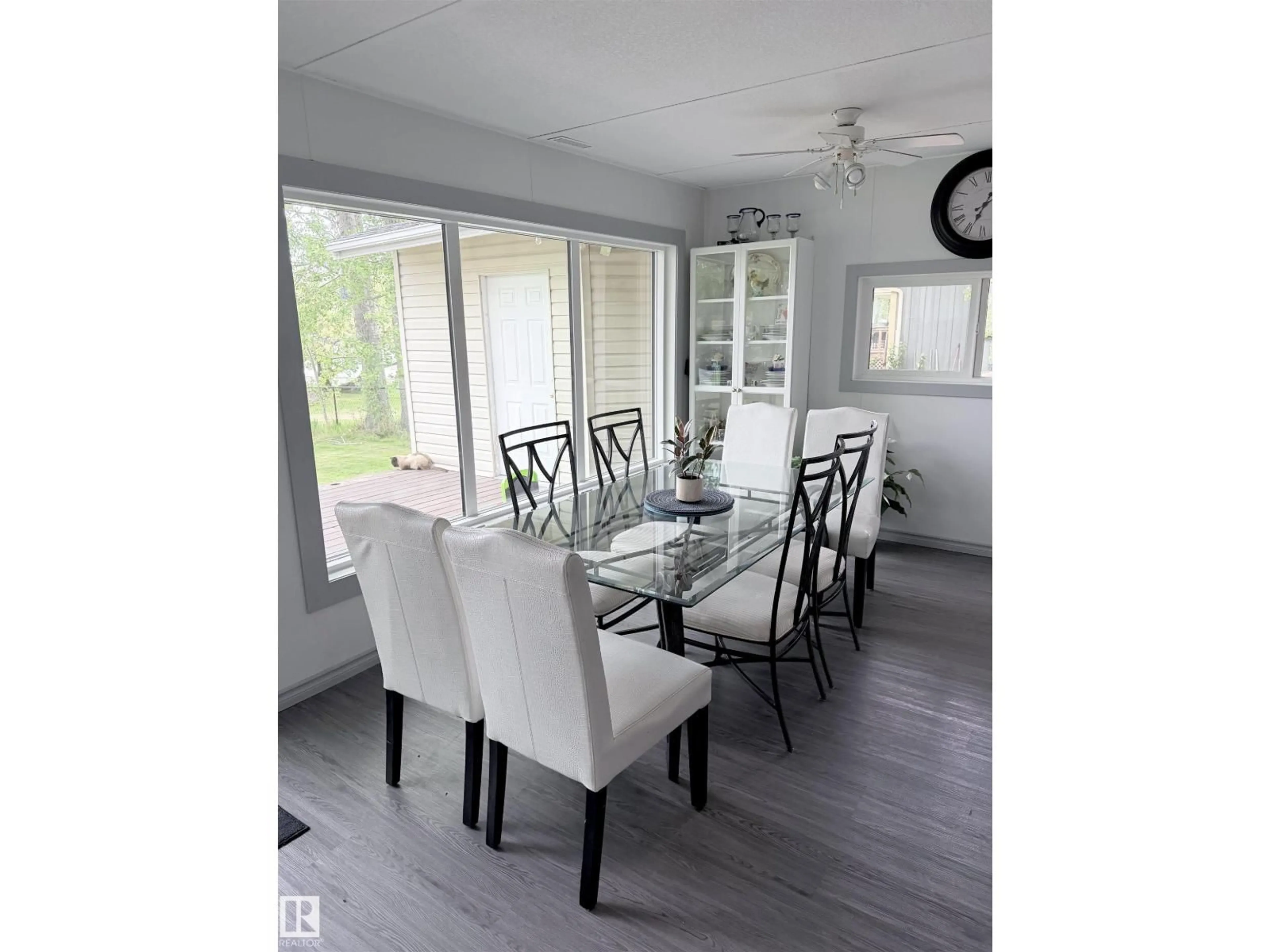 Dining room, wood/laminate floor for #214 - 57114 RGE RD 25, Rural Barrhead County Alberta T0E1A0
