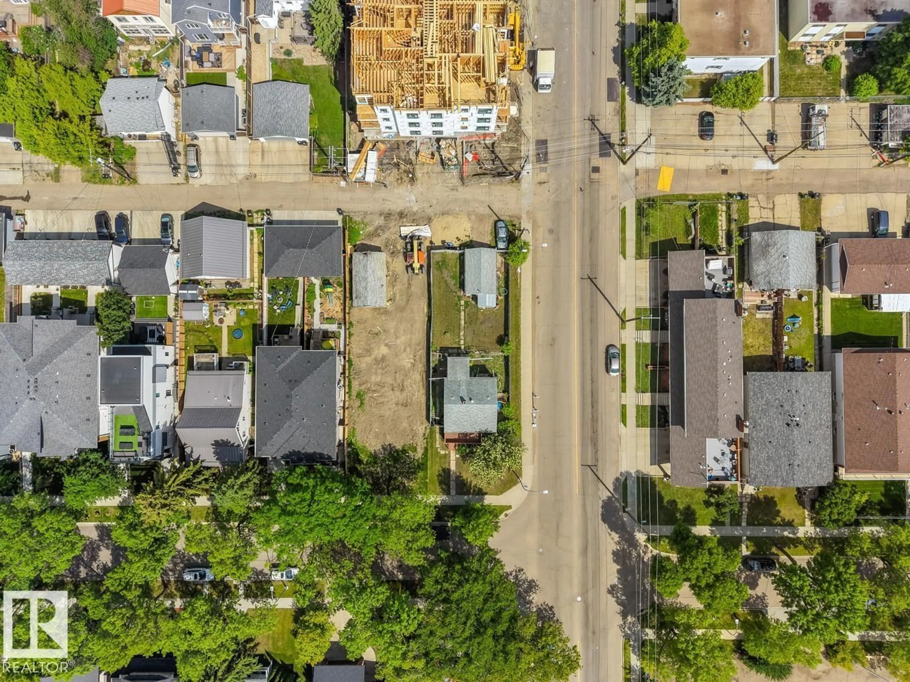A pic from outside/outdoor area/front of a property/back of a property/a pic from drone, street for 9102 83 AV, Edmonton Alberta T6C1B7