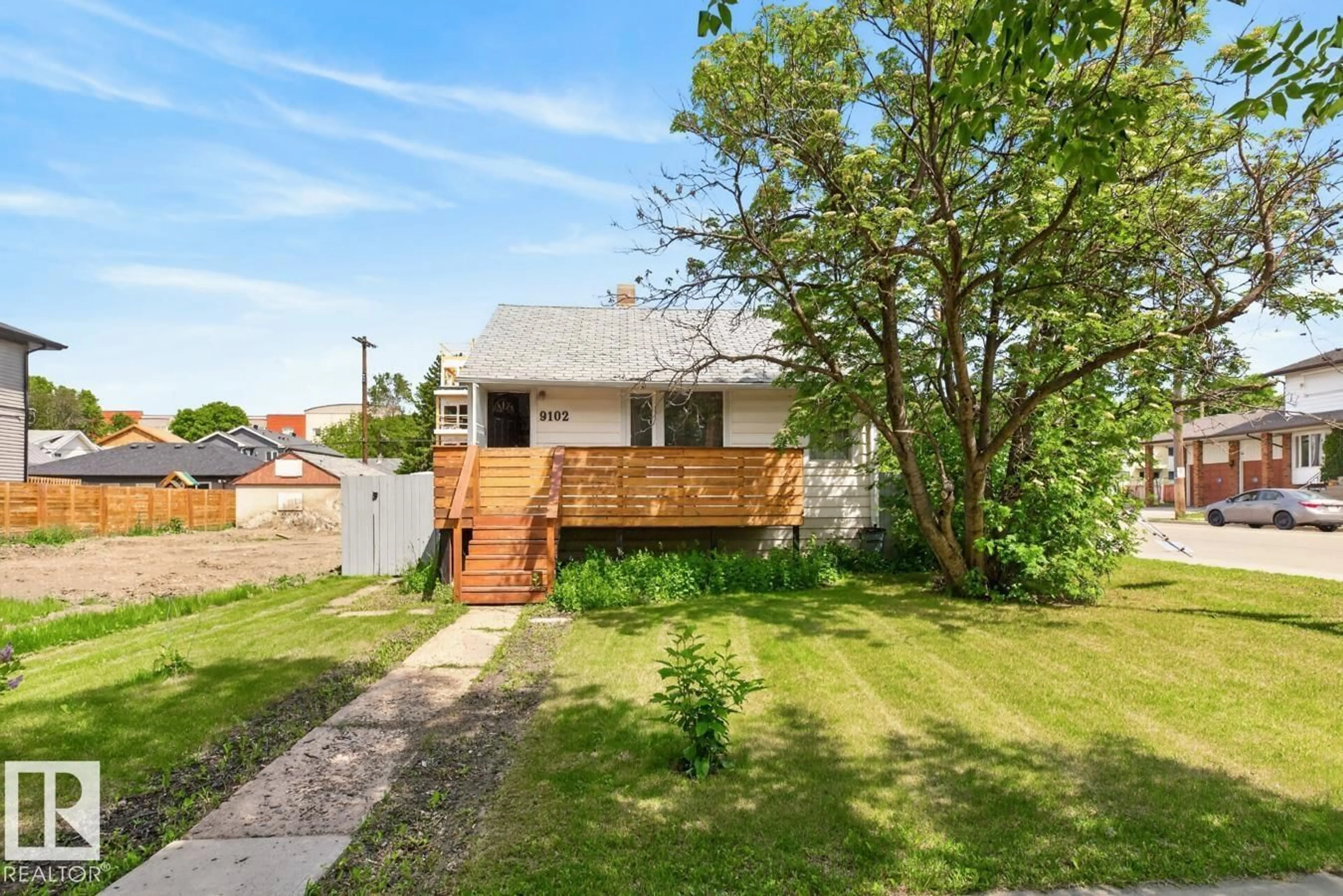 A pic from outside/outdoor area/front of a property/back of a property/a pic from drone, street for 9102 83 AV, Edmonton Alberta T6C1B7