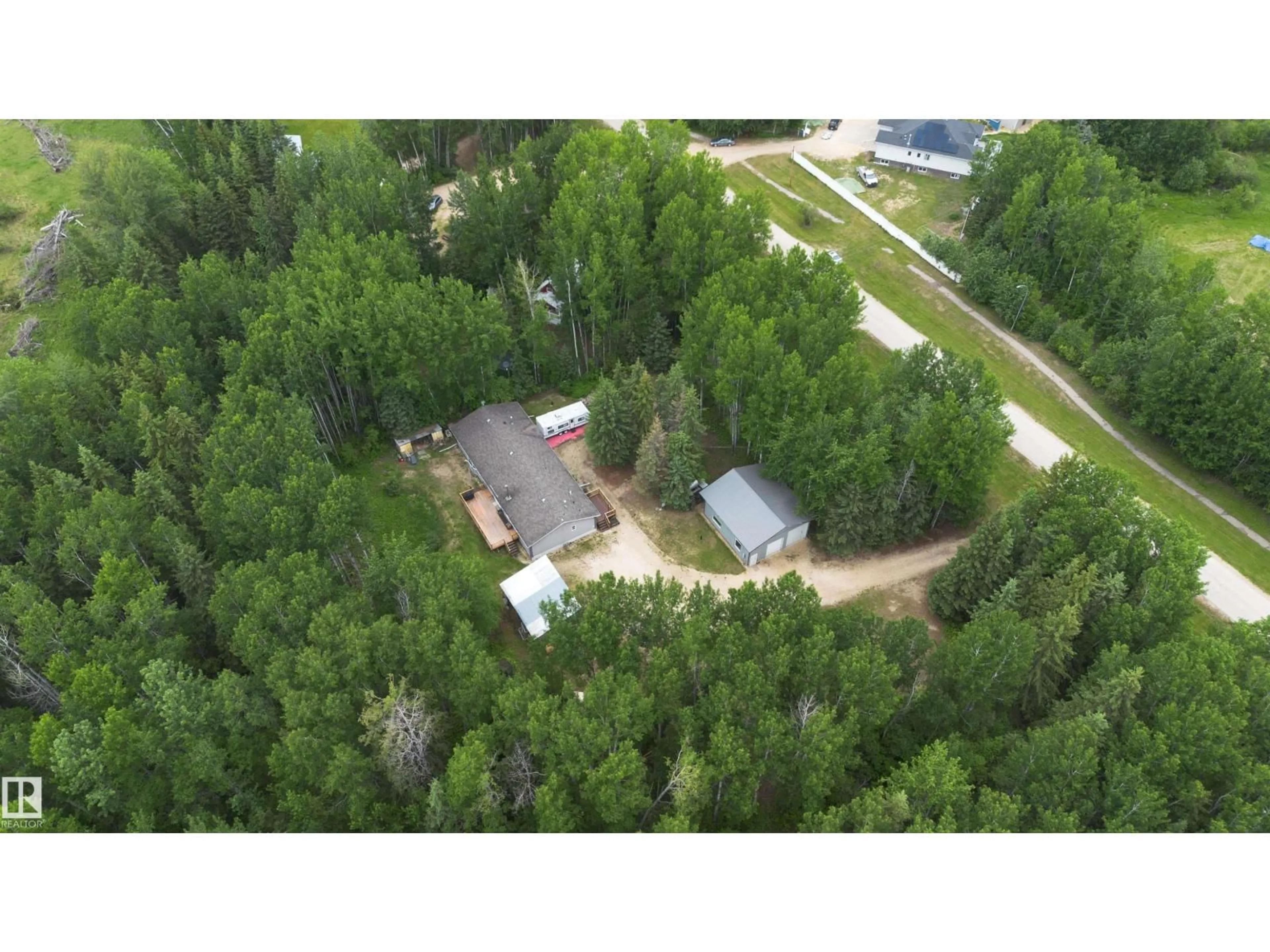 A pic from outside/outdoor area/front of a property/back of a property/a pic from drone, forest/trees view for 5 CARLSON DR, Rural Woodlands County Alberta T0G1M0