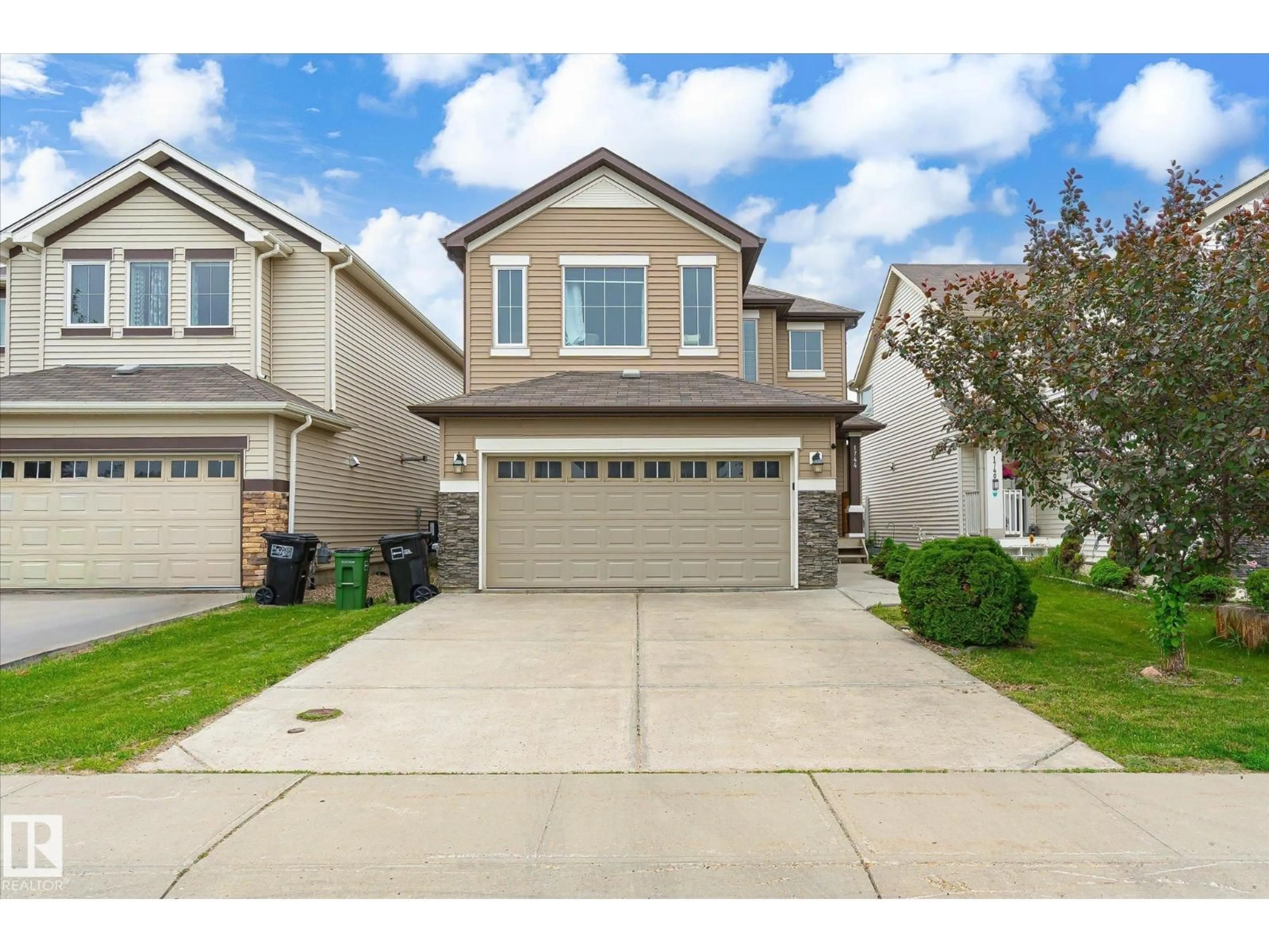 Home with vinyl exterior material, street for SW - 1744 61 ST, Edmonton Alberta T6X0W3