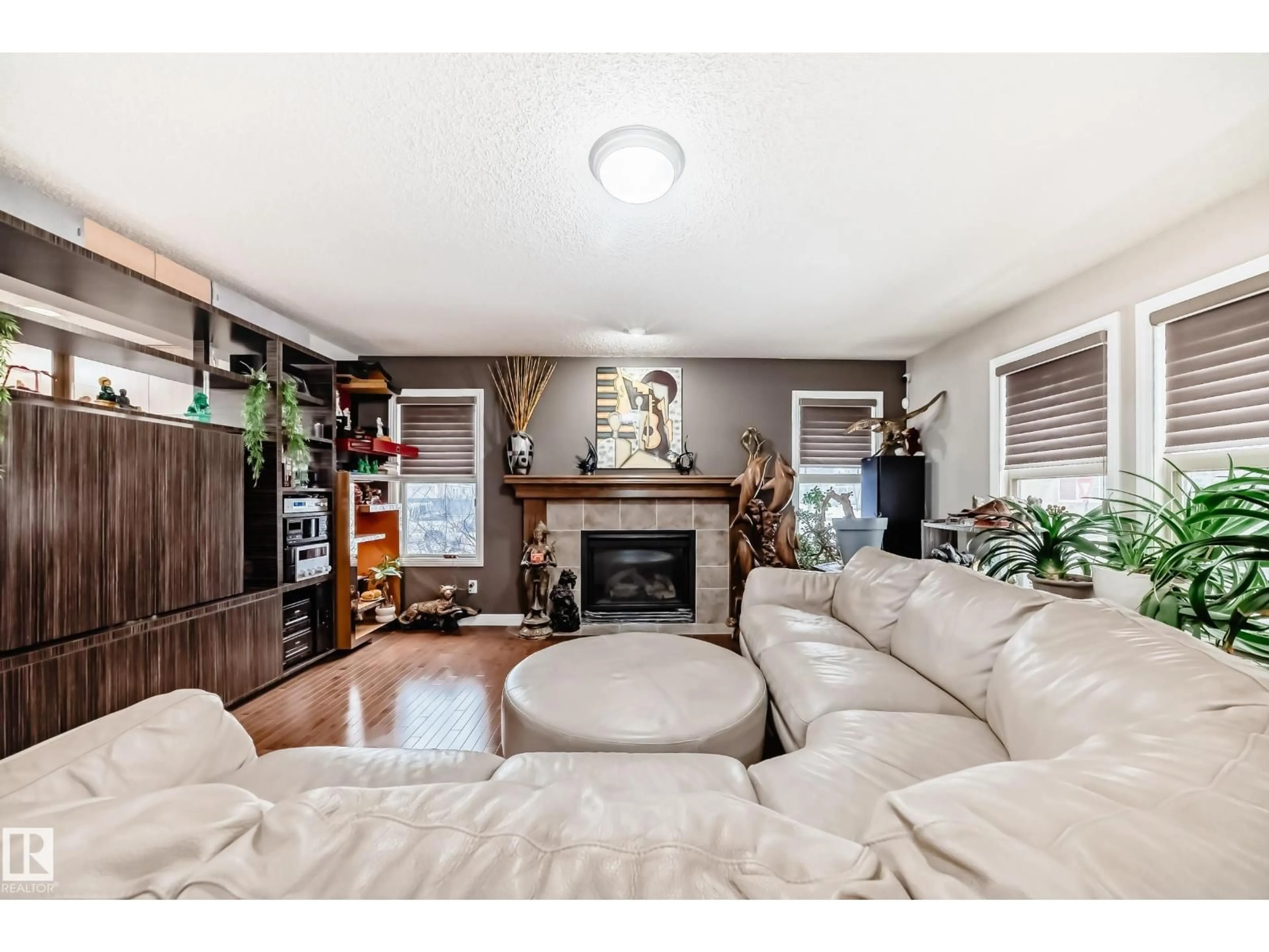 Living room with furniture, wood/laminate floor for 351 GRIESBACH SCHOOL RD, Edmonton Alberta T5E6N1
