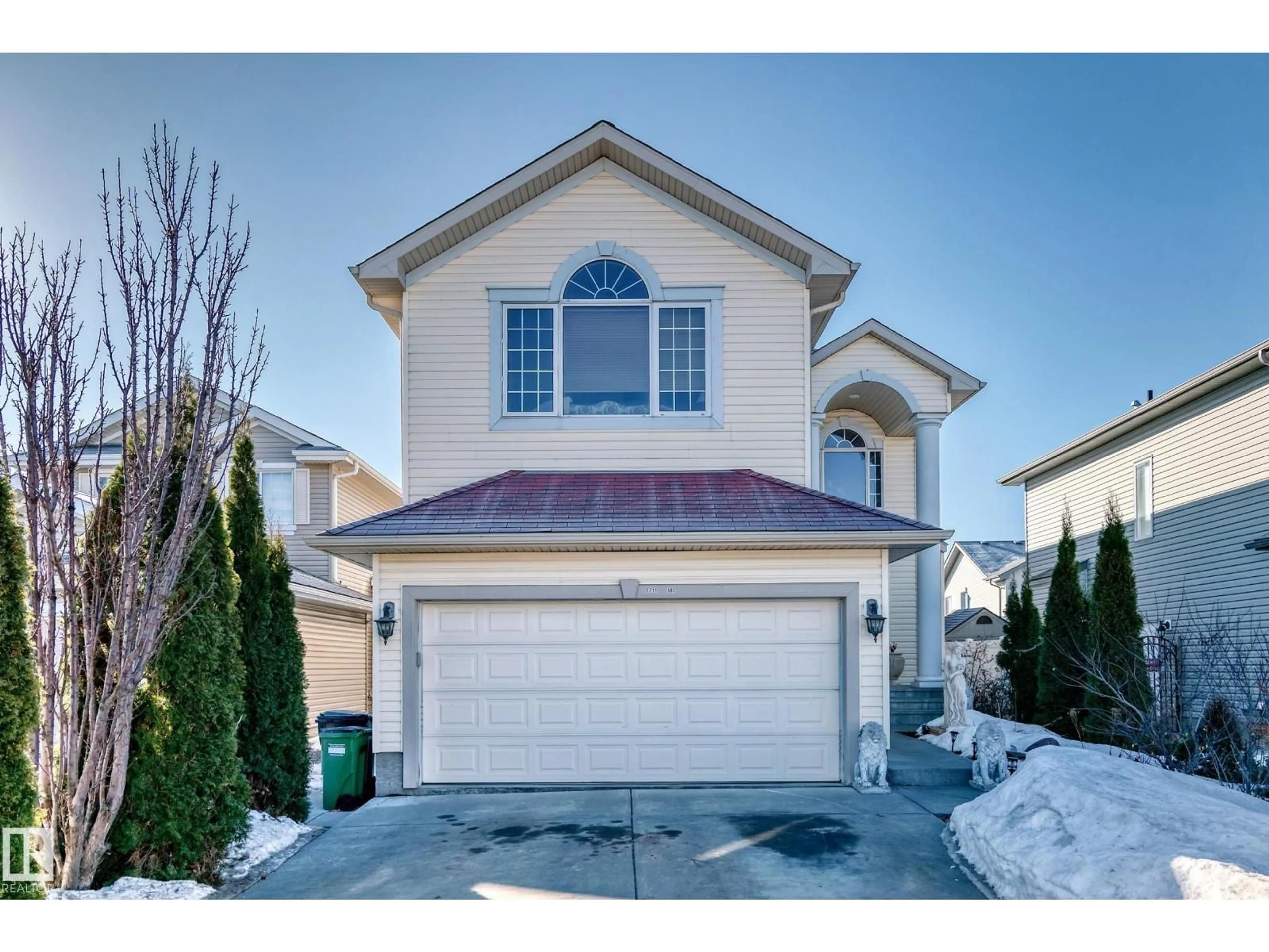 Home with vinyl exterior material, street for 3711 163 AV, Edmonton Alberta T5Y0H9
