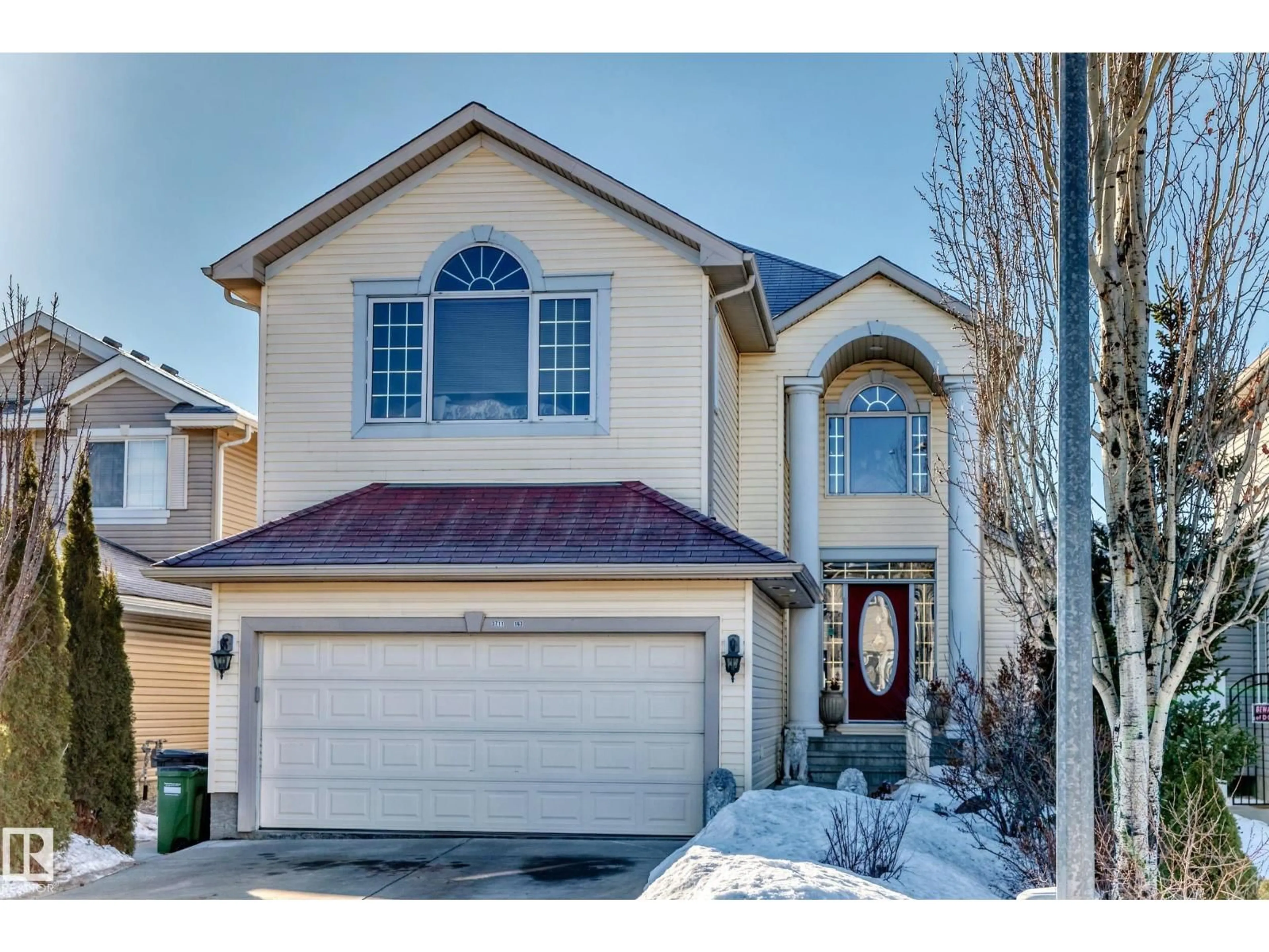 Home with vinyl exterior material, street for 3711 163 AV, Edmonton Alberta T5Y0H9