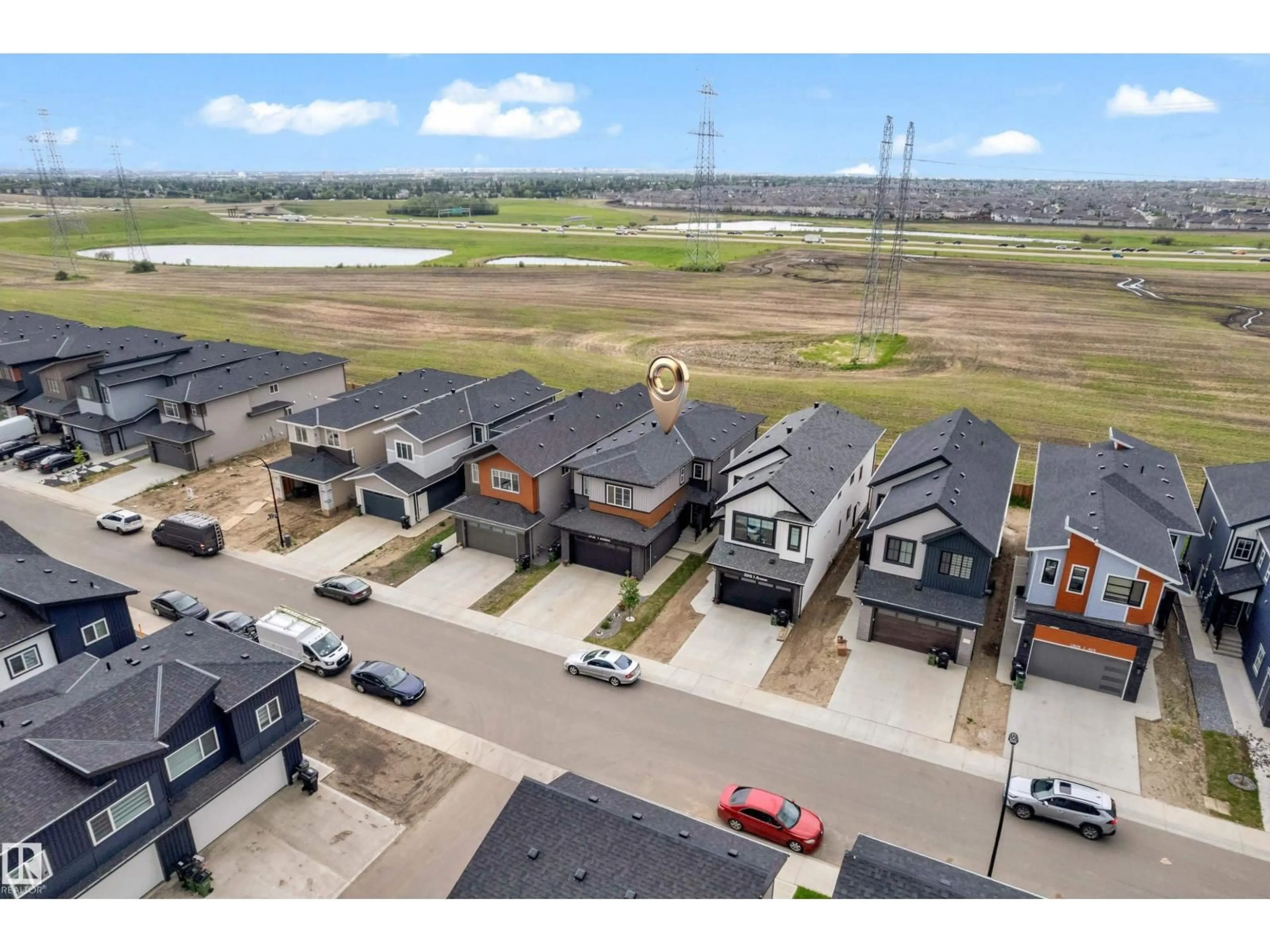 A pic from outside/outdoor area/front of a property/back of a property/a pic from drone, street for 2820 1 AV SW, Edmonton Alberta T6X3E2