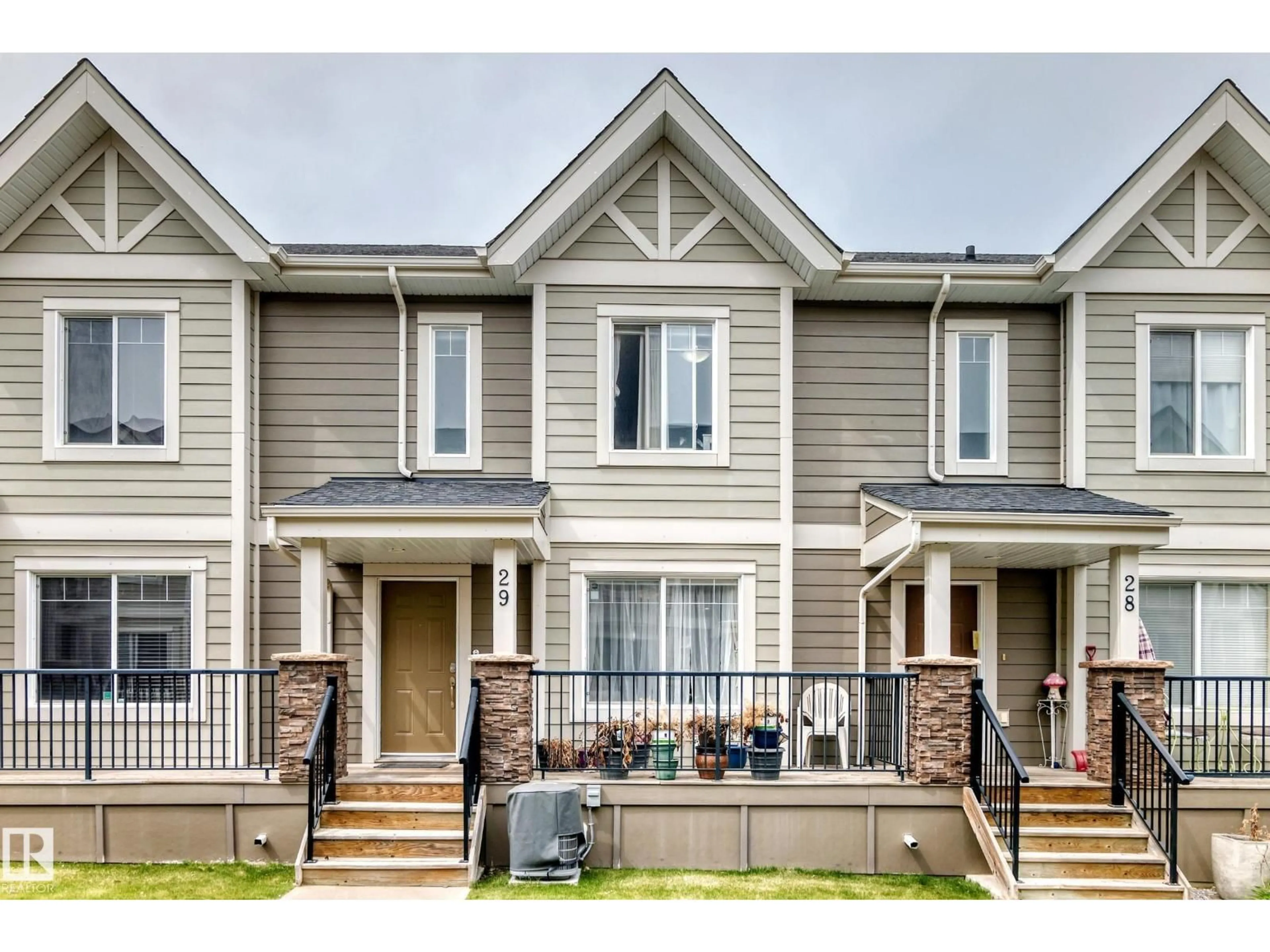 Home with vinyl exterior material, street for 29 - 1150 WINDERMERE WY, Edmonton Alberta T6W2B6