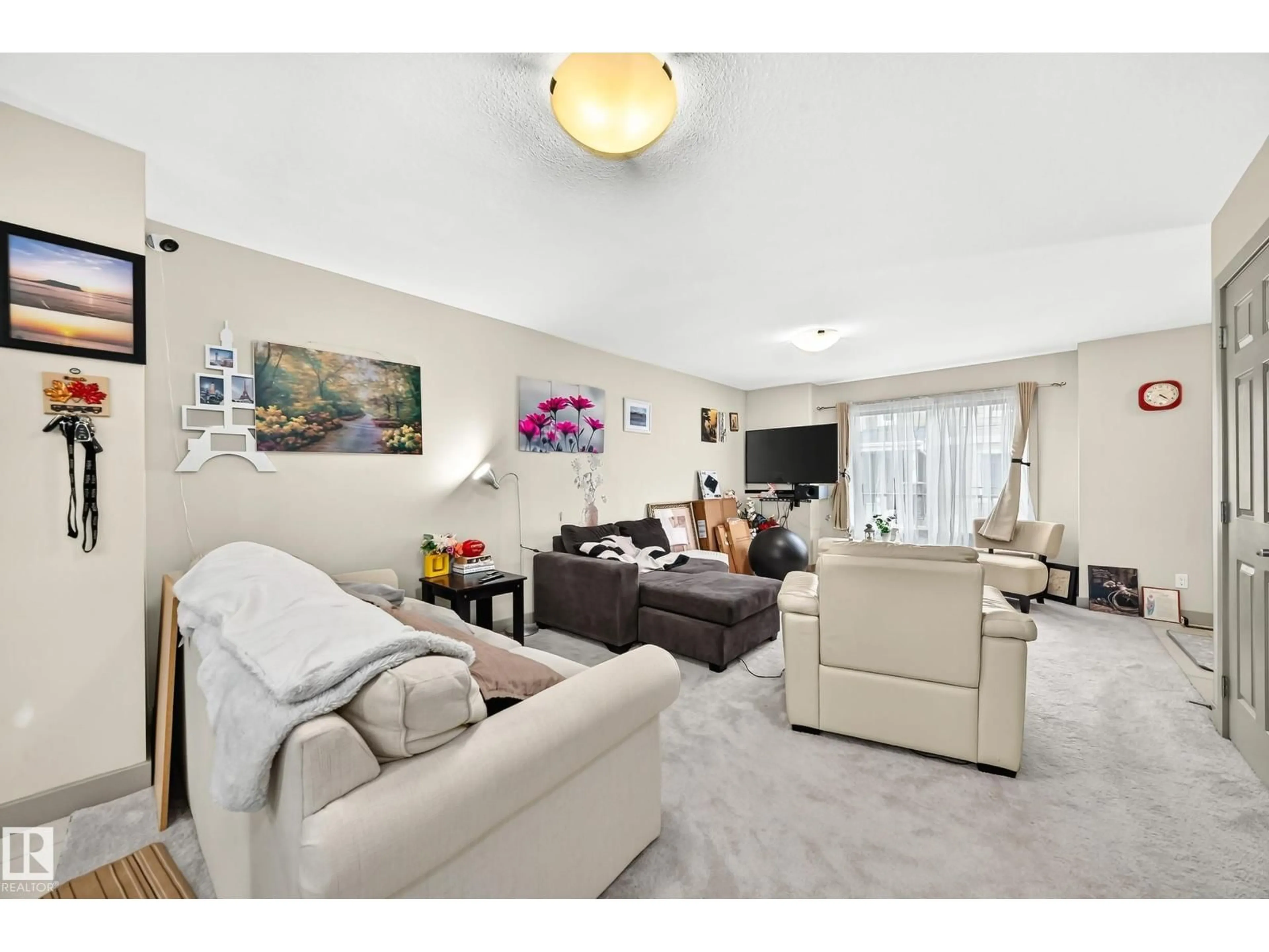 Living room with furniture, unknown for 29 - 1150 WINDERMERE WY, Edmonton Alberta T6W2B6