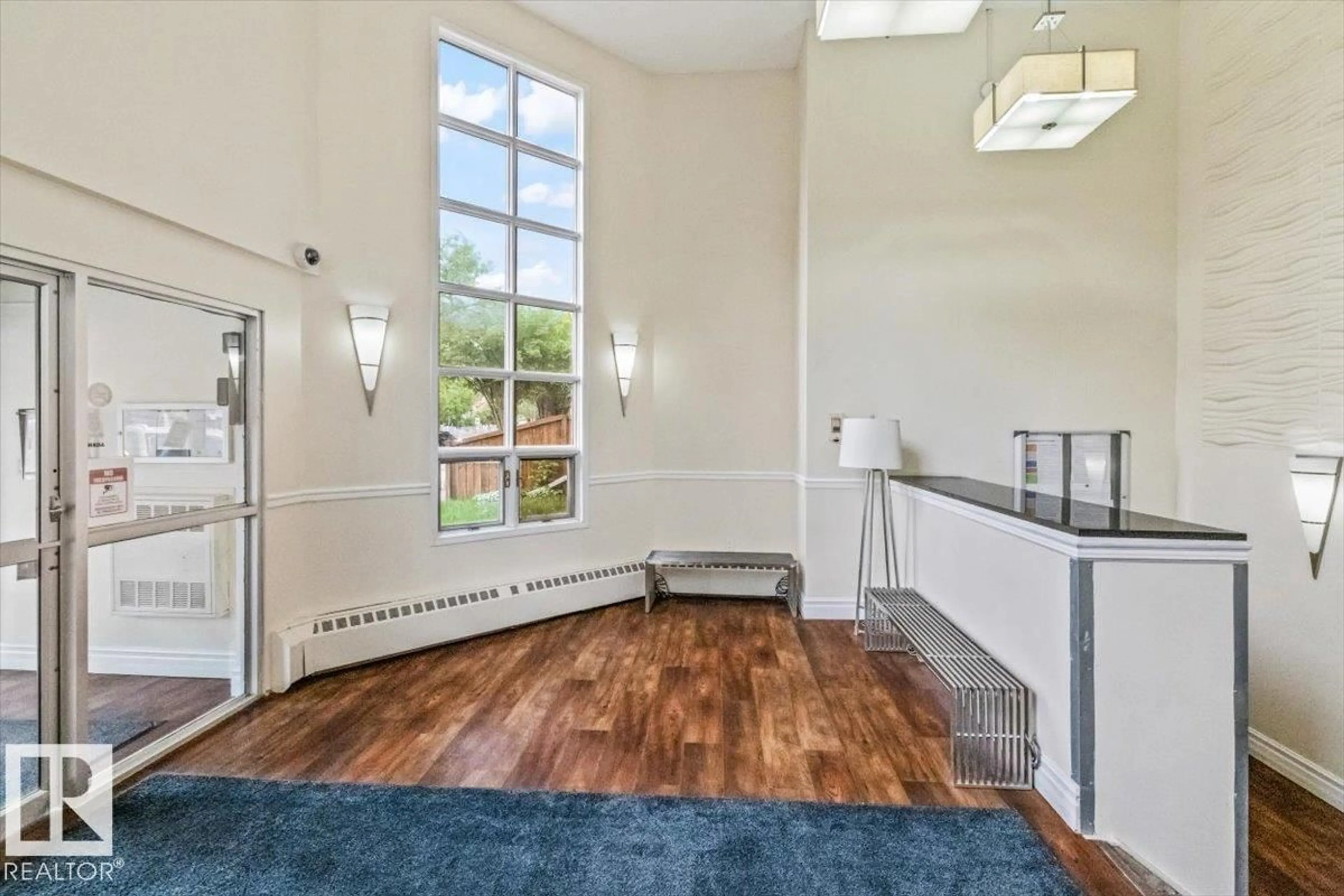 Indoor foyer for #113 - 9010 106 AV, Edmonton Alberta T5H4K3