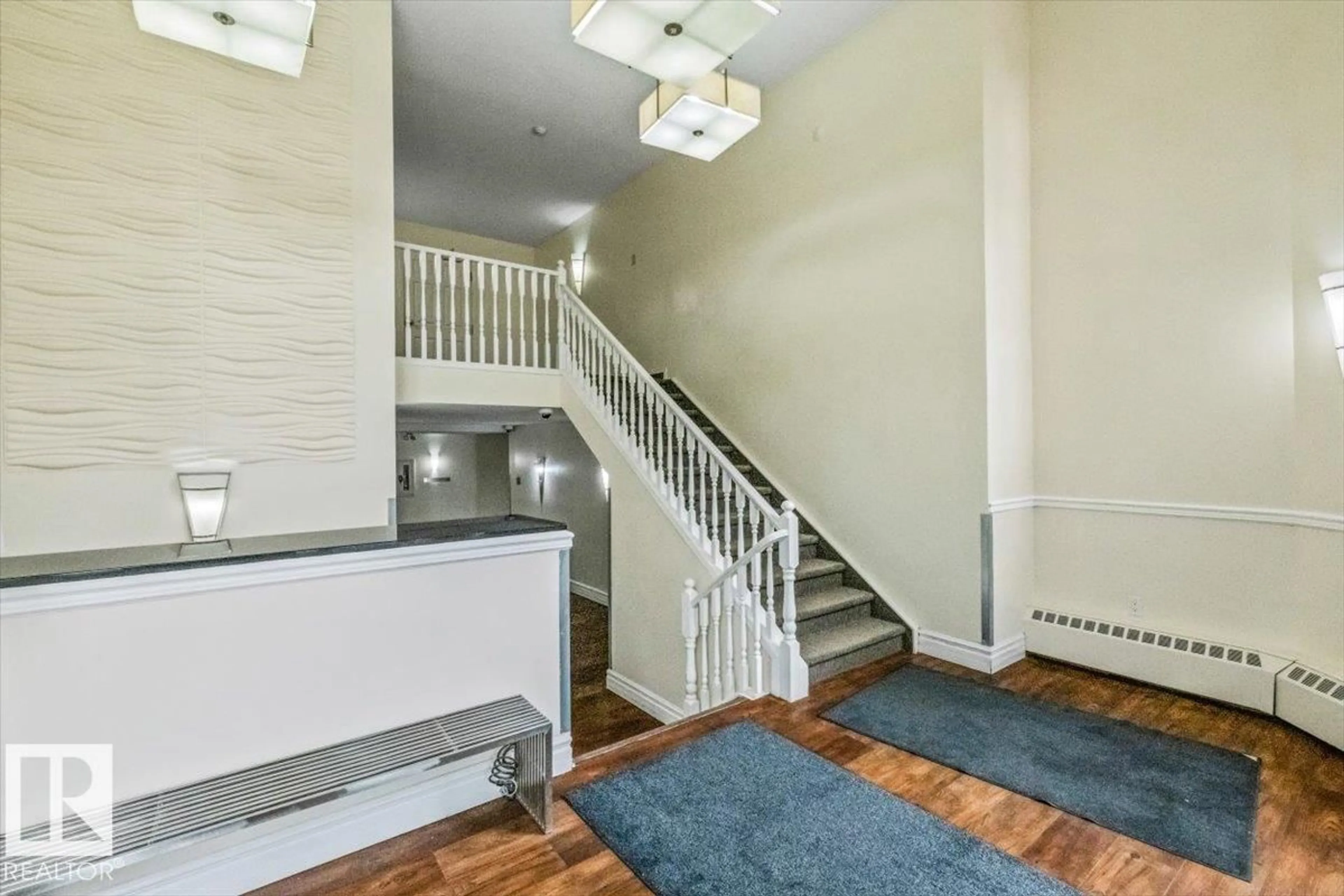 Indoor foyer for #113 - 9010 106 AV, Edmonton Alberta T5H4K3