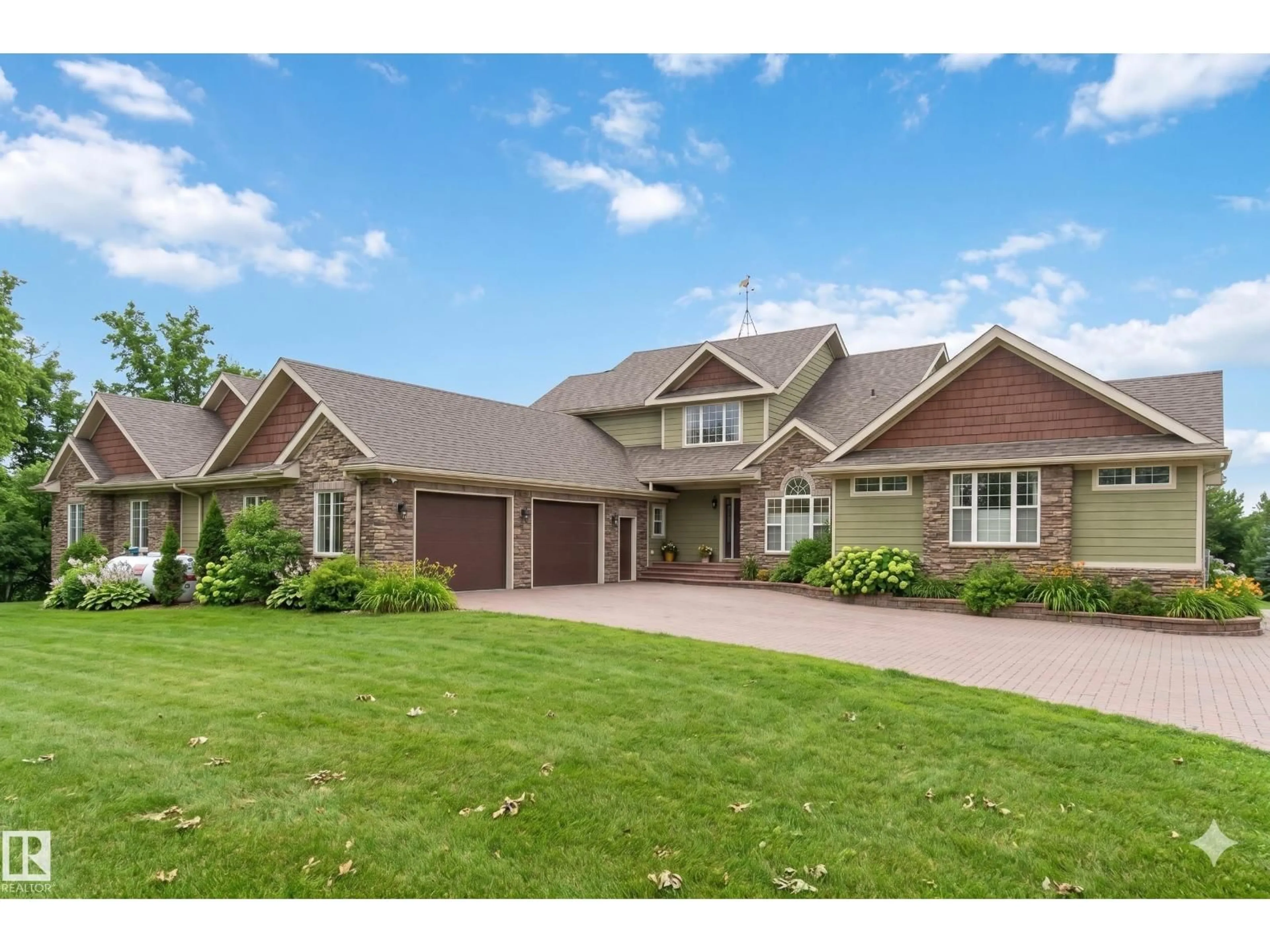 Home with brick exterior material, street for 50344 RGE RD 243, Rural Leduc County Alberta T4X0N5
