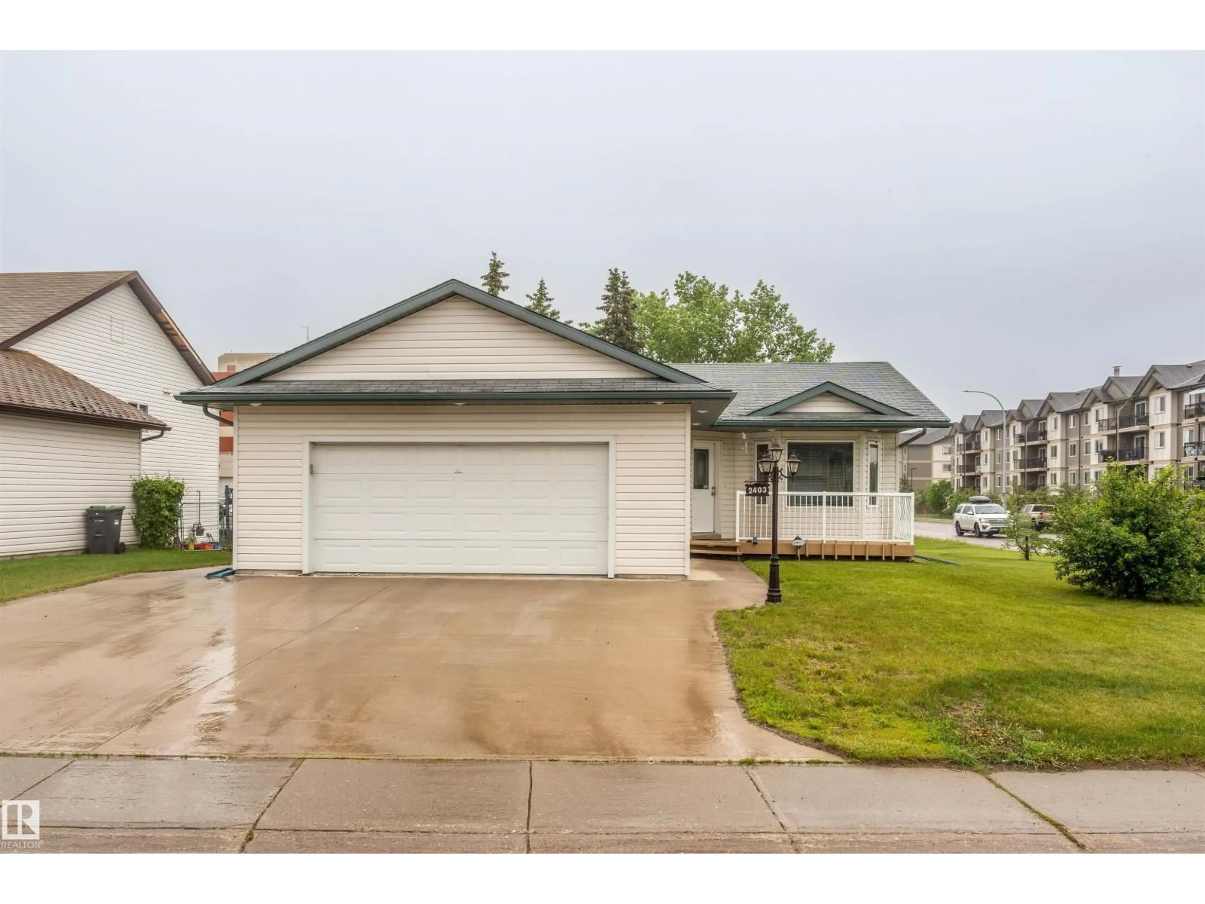 Home with vinyl exterior material, street for 2403 3 AV, Cold Lake Alberta T9M0A4