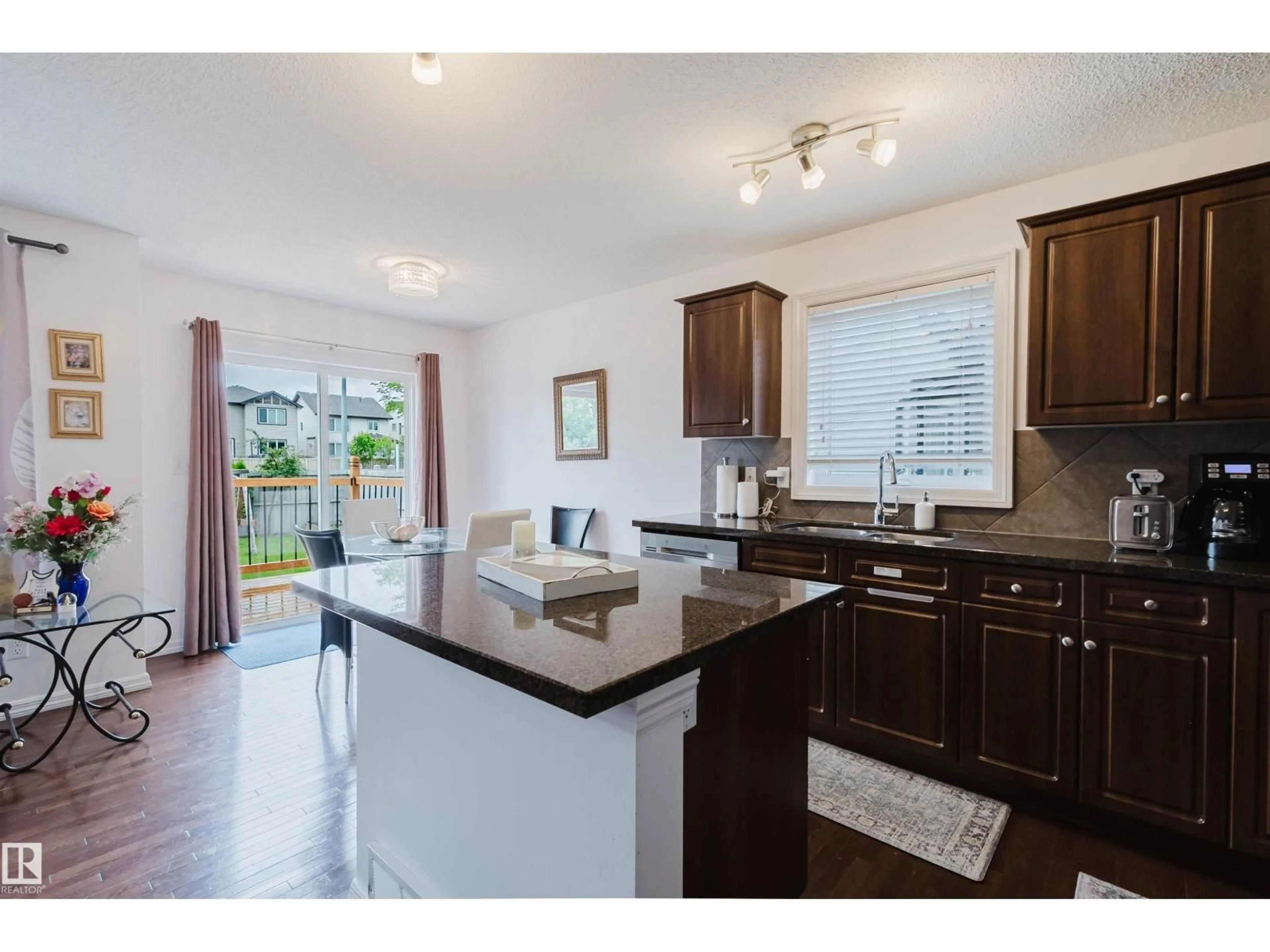 Open concept kitchen, ceramic/tile floor for 1289 CUNNINGHAM DR, Edmonton Alberta T6W0R7