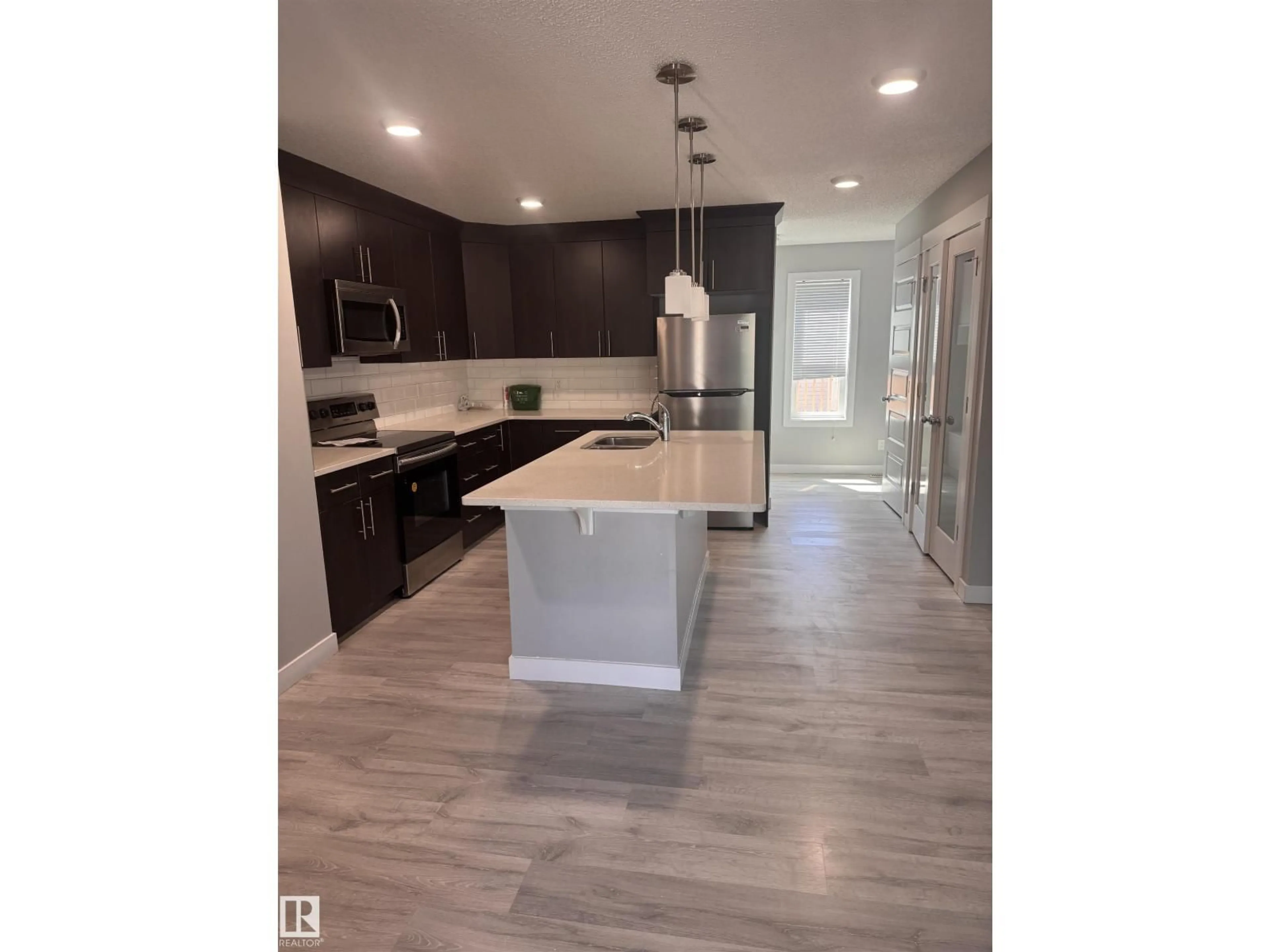 Open concept kitchen, ceramic/tile floor for 1313 CHAPPELLE BV, Edmonton Alberta T6W3S2