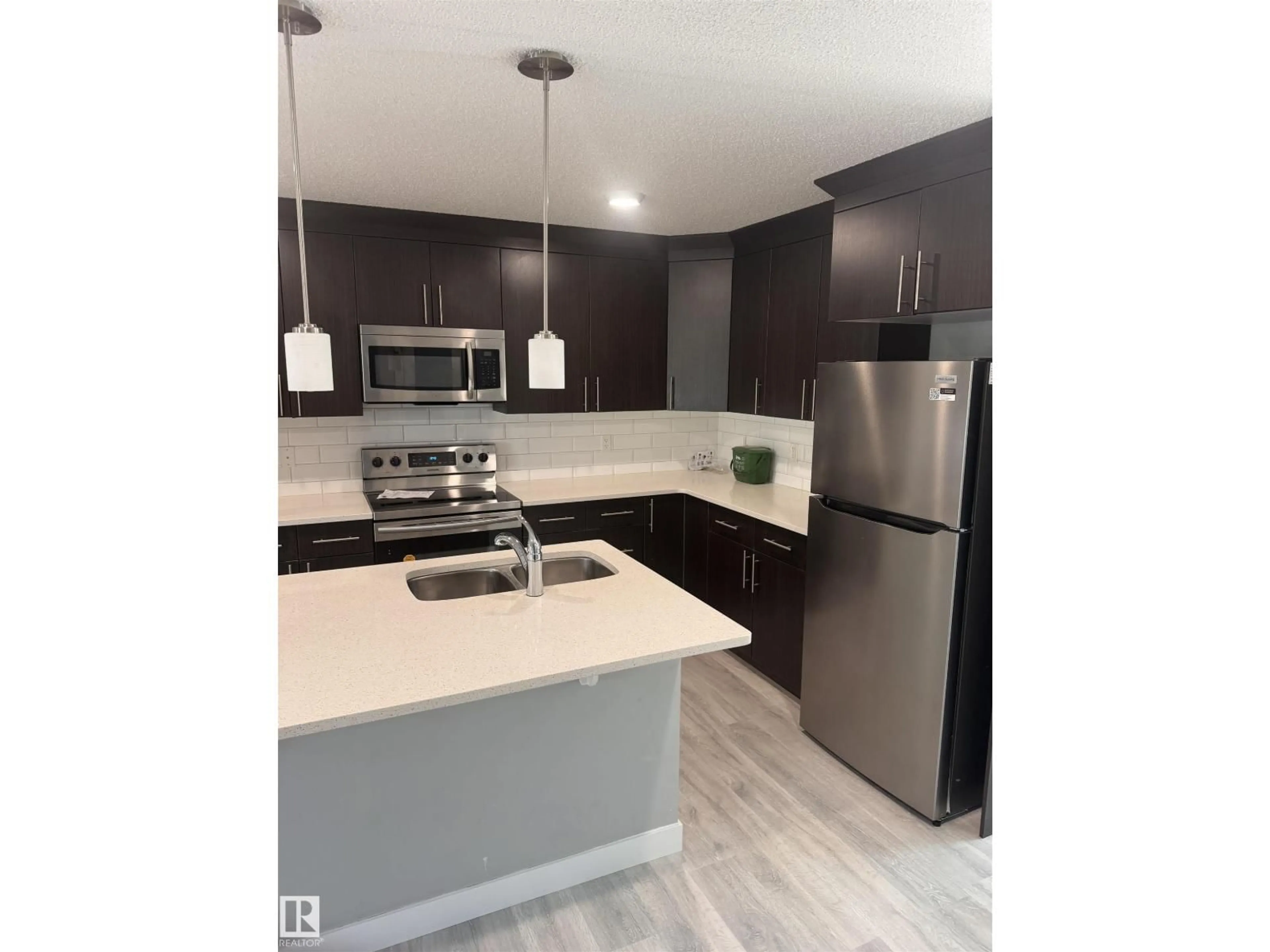 Open concept kitchen, unknown for 1313 CHAPPELLE BV, Edmonton Alberta T6W3S2