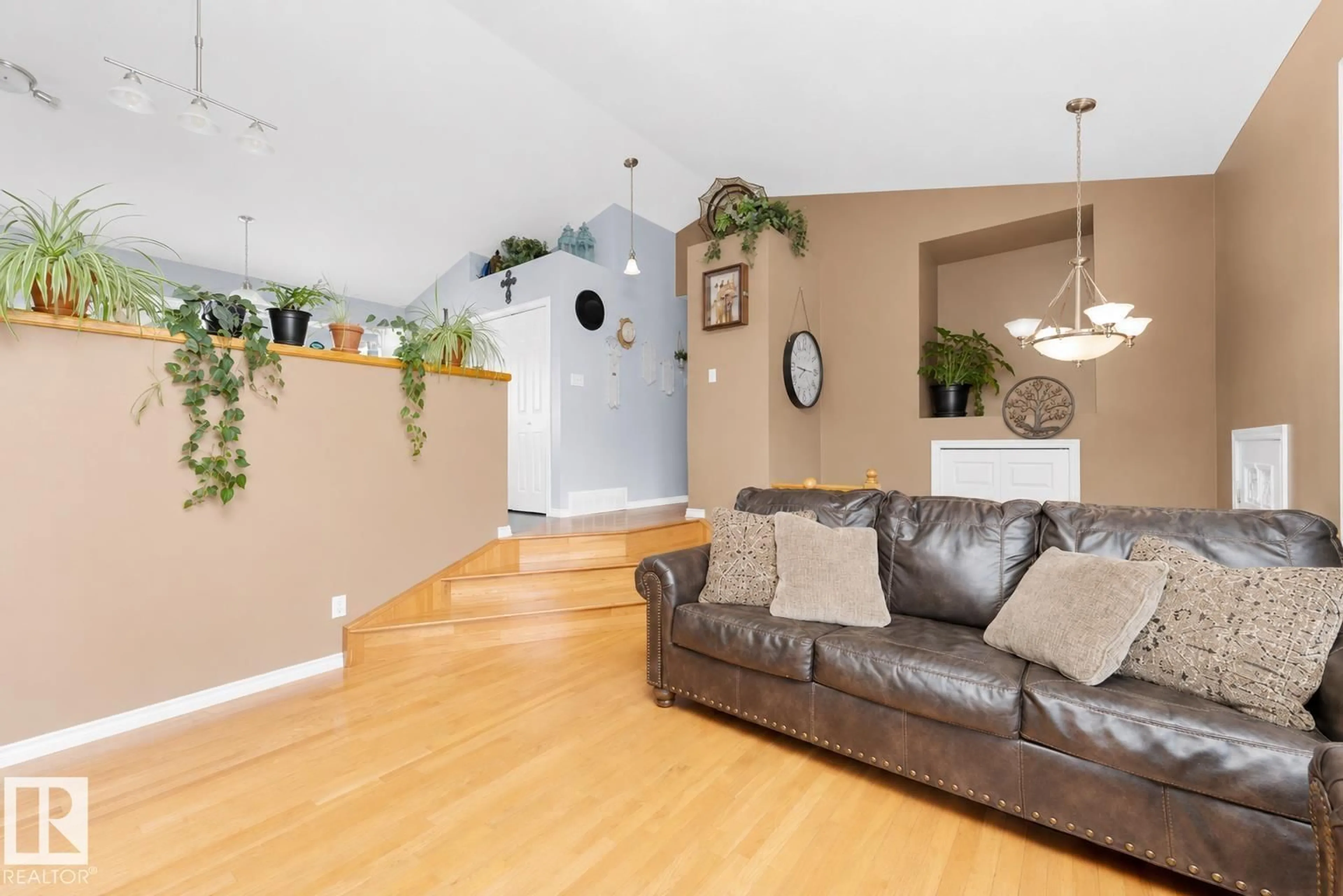 Living room with furniture, wood/laminate floor for 4804 45 ST, Cold Lake Alberta T9M1N7