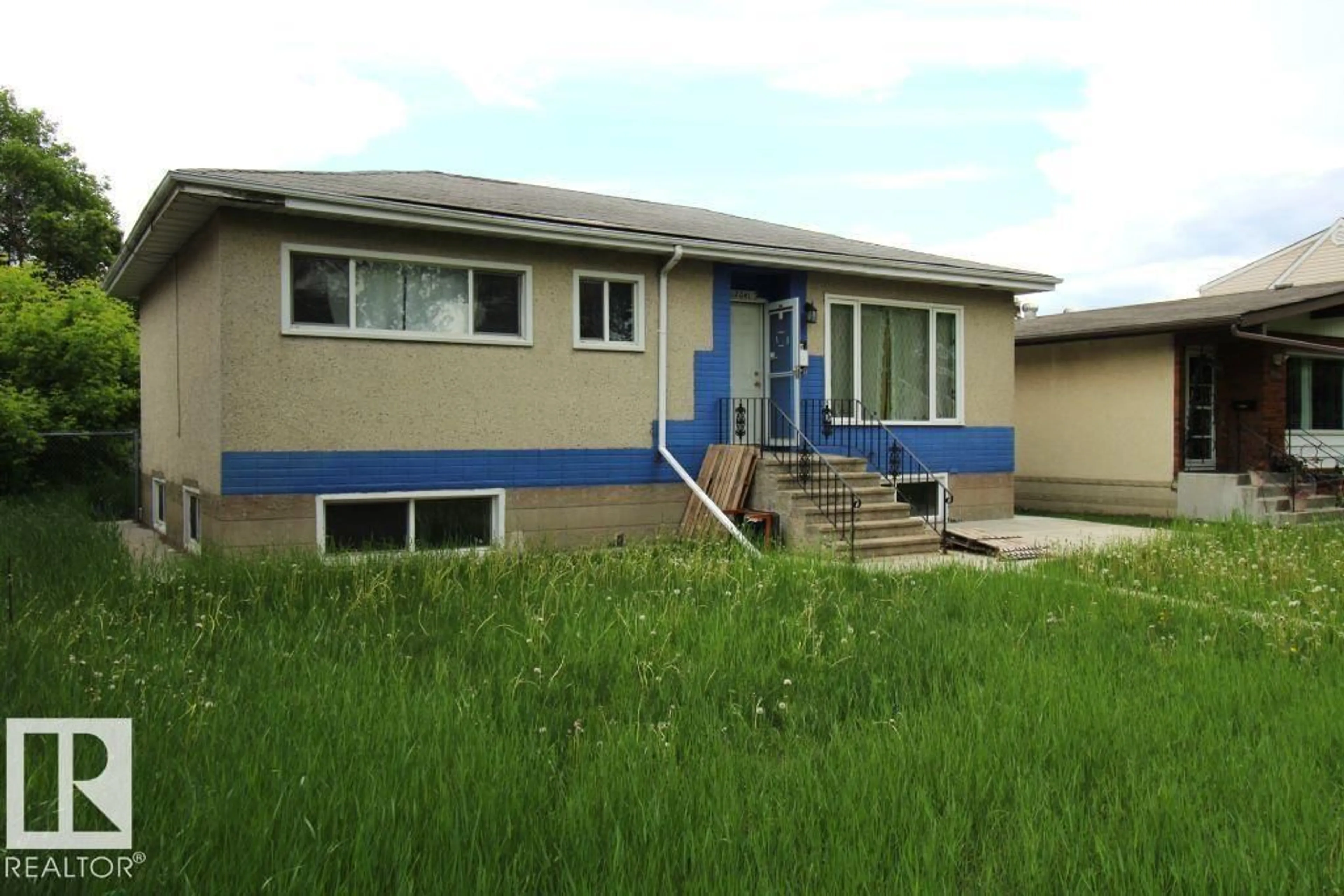 Home with vinyl exterior material, street for NW - 12041 86 ST, Edmonton Alberta T5B3K5