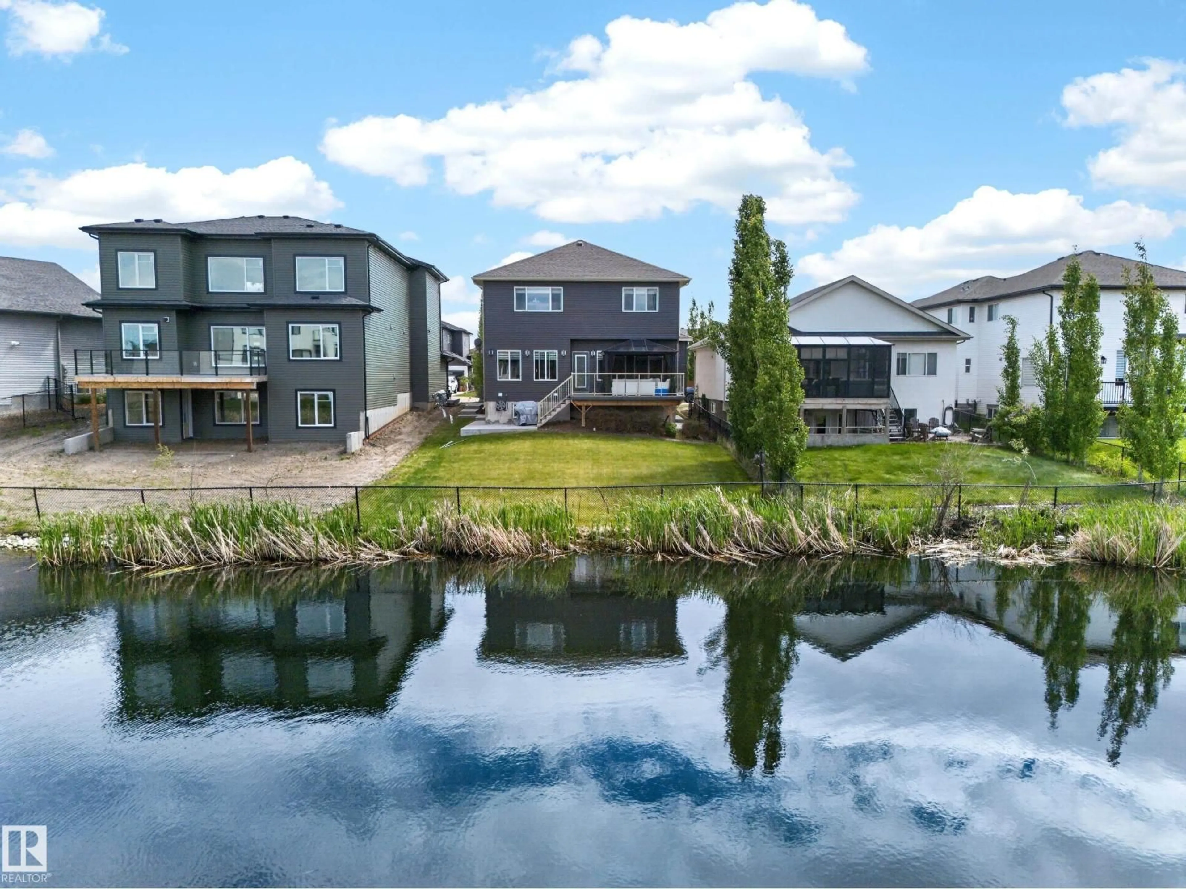 A pic from outside/outdoor area/front of a property/back of a property/a pic from drone, water/lake/river/ocean view for 92 LAKELAND CR, Beaumont Alberta T5X0B5